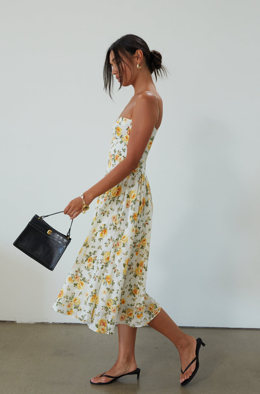 Floral printed woven midi dress. Adjustable straps. Underwire cups. Side pockets. Back hook and eye and zipper closures. Fully lined. floral midi dress. summer dress. summer midi dress. 