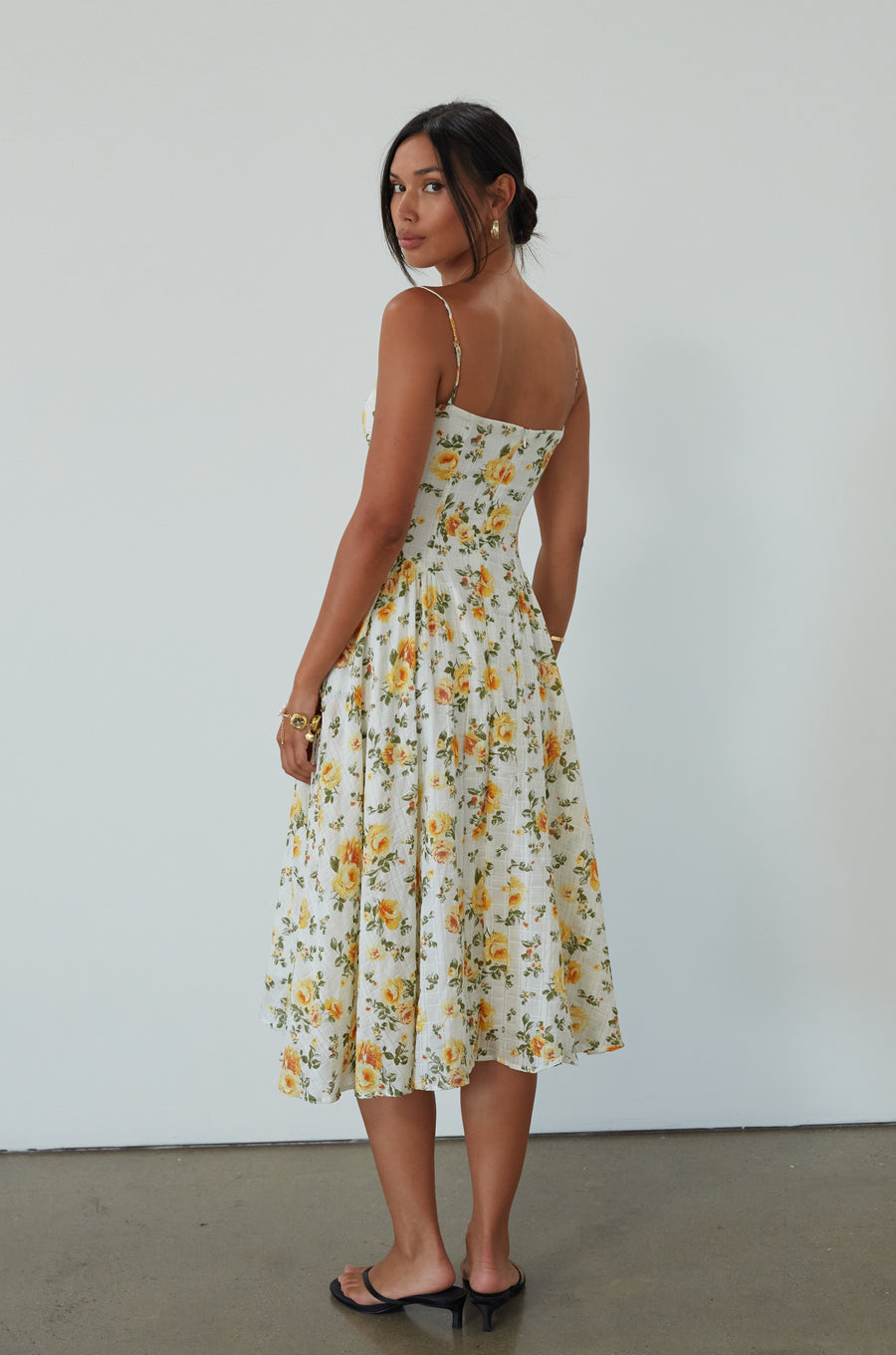 Floral printed woven midi dress. Adjustable straps. Underwire cups. Side pockets. Back hook and eye and zipper closures. Fully lined. floral midi dress. summer dress. summer midi dress. 