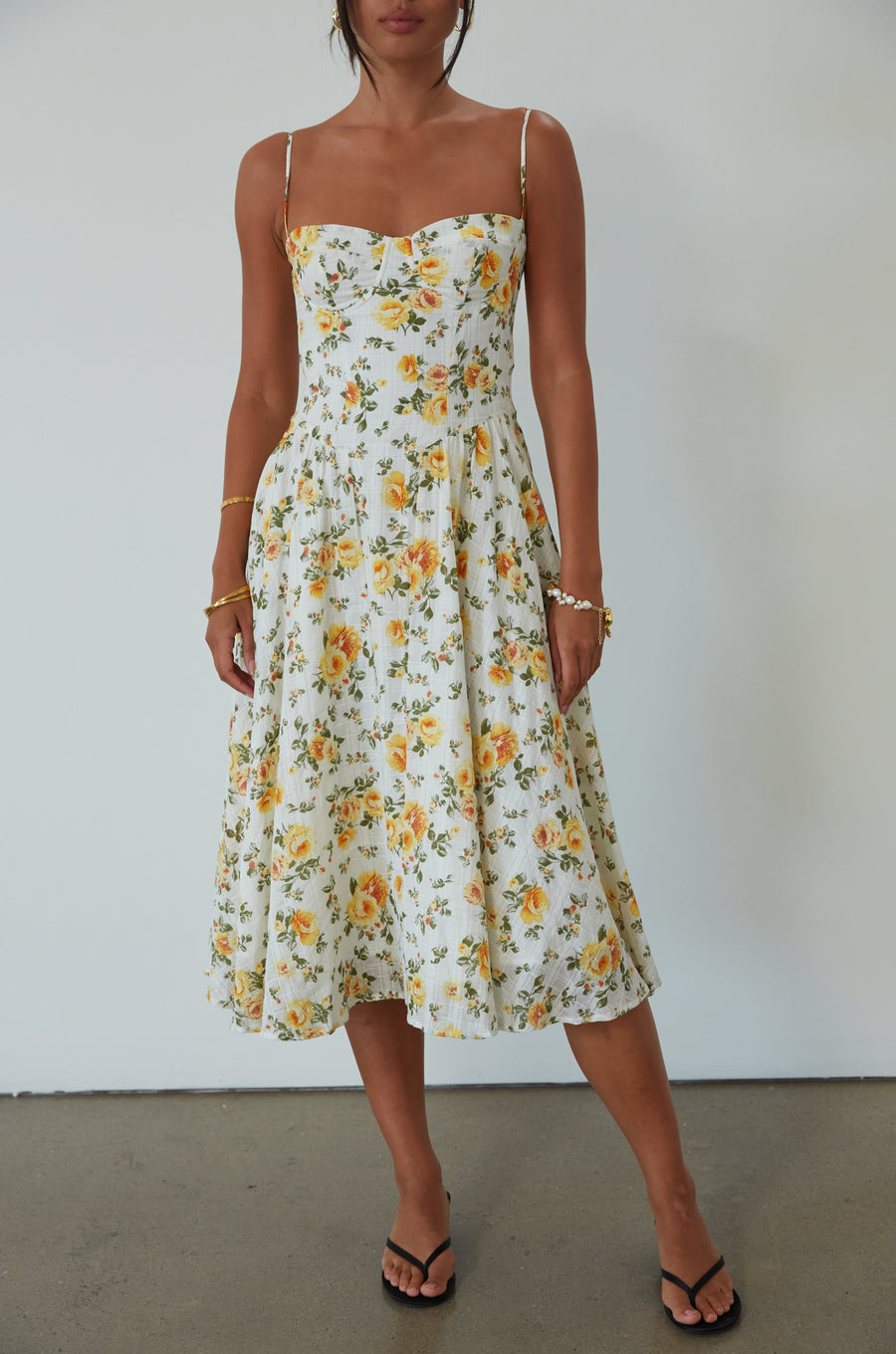 Floral printed woven midi dress. Adjustable straps. Underwire cups. Side pockets. Back hook and eye and zipper closures. Fully lined. floral midi dress. summer dress. summer midi dress. 