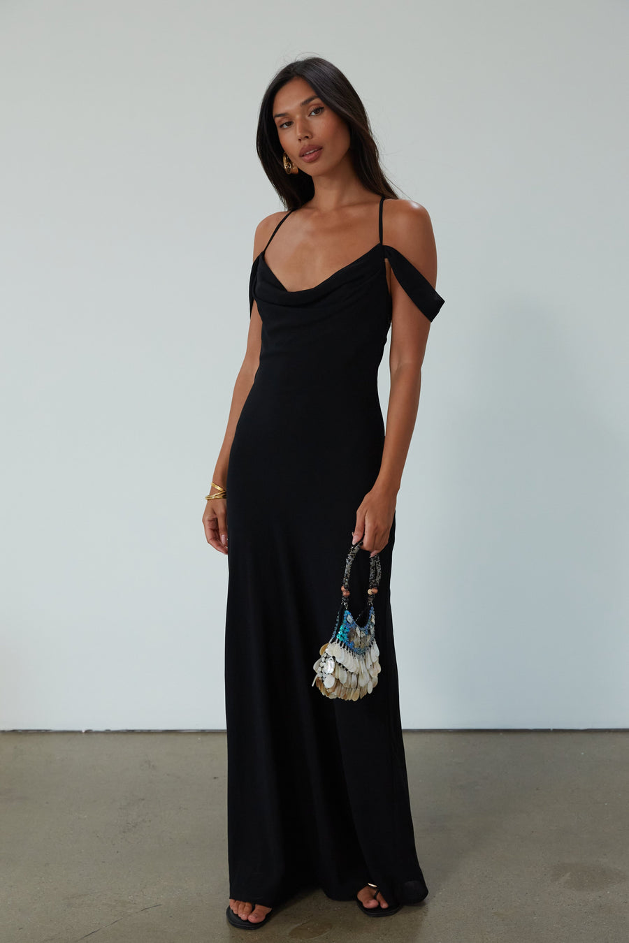 Chiffon maxi dress. Adjustable crisscross back straps. Side zipper closure. Fully lined. black maxi dress. wedding guest dress