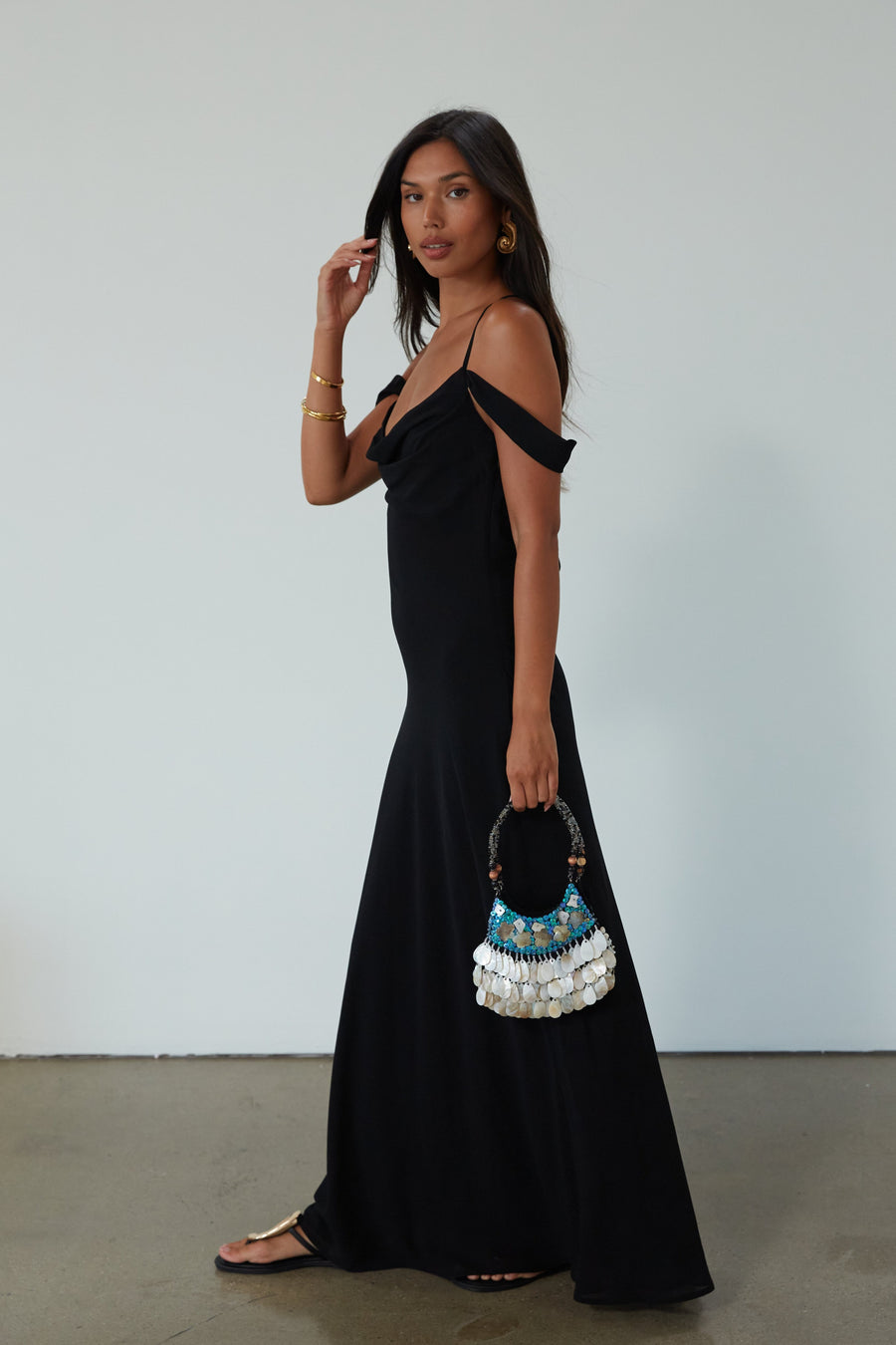 Chiffon maxi dress. Adjustable crisscross back straps. Side zipper closure. Fully lined. black maxi dress. wedding guest dress