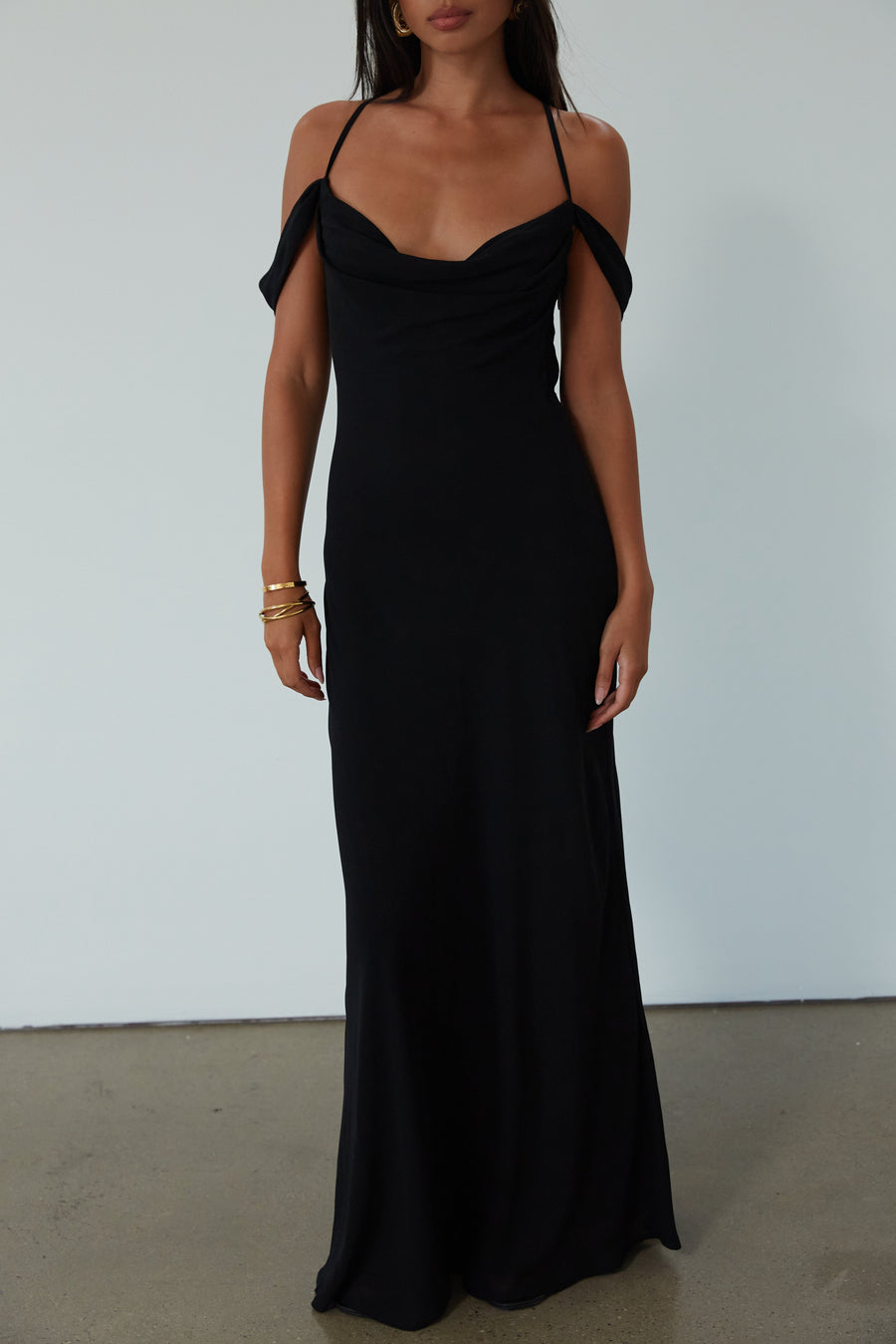 Chiffon maxi dress. Adjustable crisscross back straps. Side zipper closure. Fully lined. black maxi dress. wedding guest dress