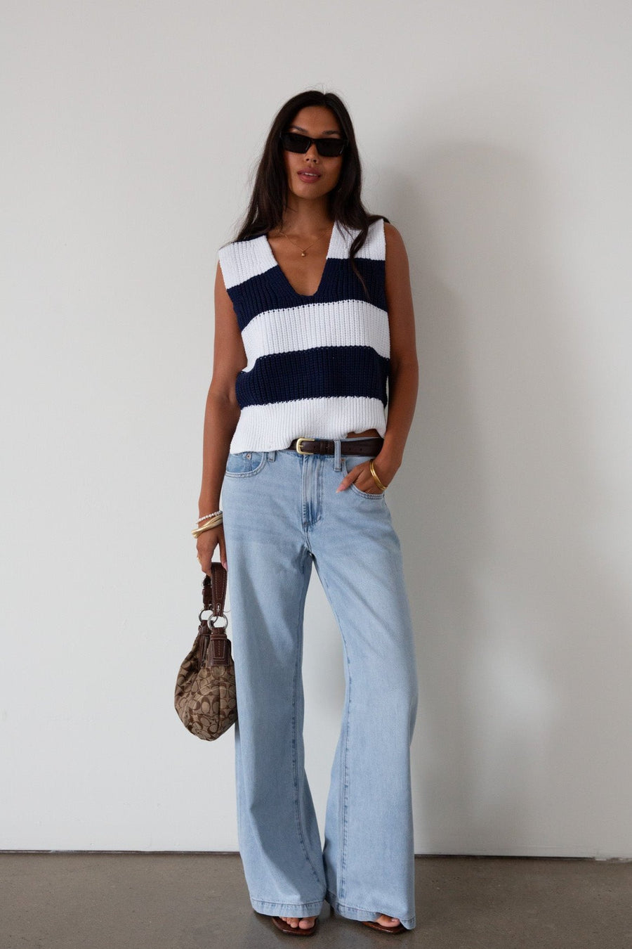 Striped crochet knit sleeveless top. Side slits. Unlined. blue and white sweater vest. striped sweater. striped sweater vest. fall outfit. 
