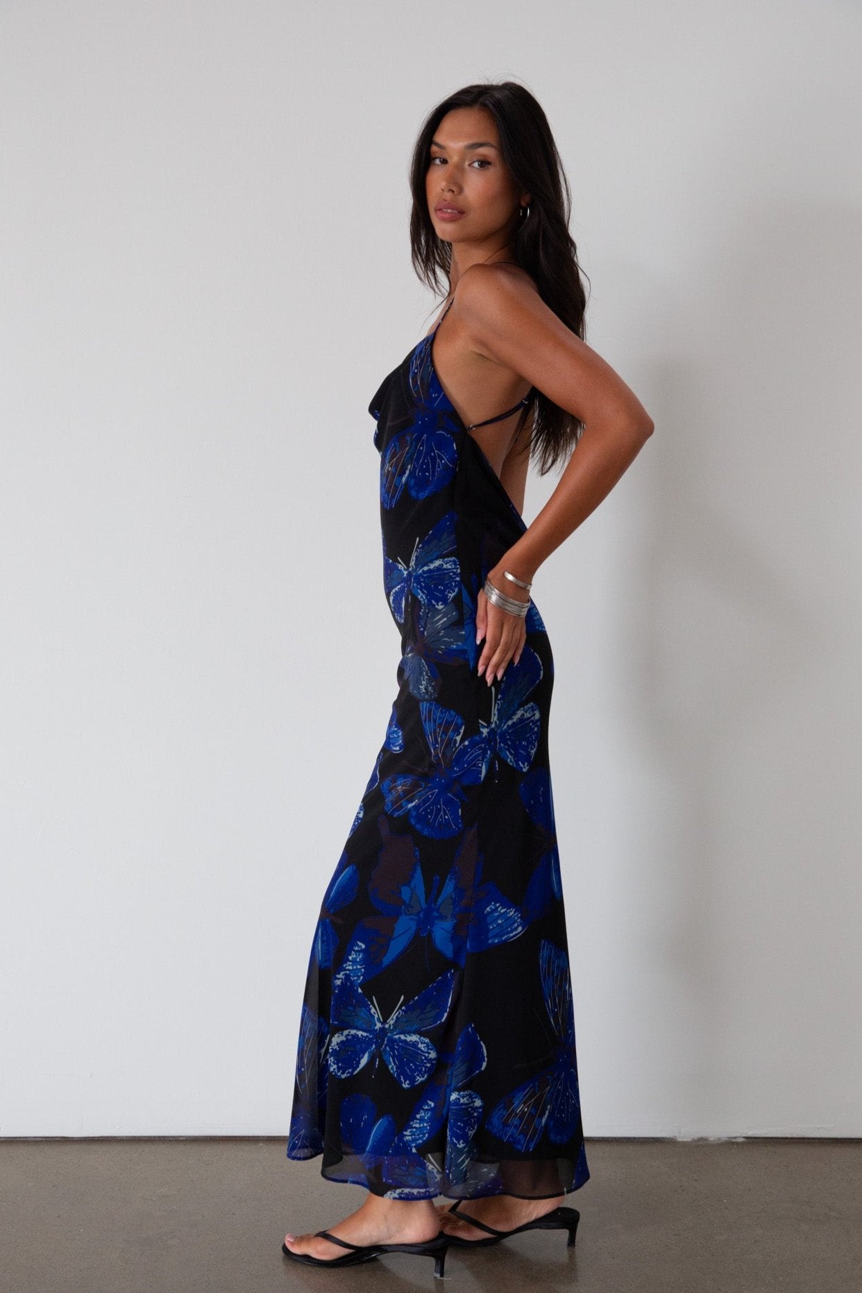 Printed chiffon maxi dress. Adjustable cross cross back straps. Side zipper closure. Fully lined. butterfly dress. blue maxi dress