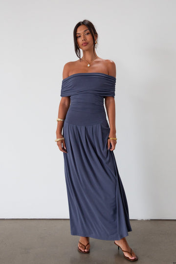 Knit maxi dress. Strapless elastic neckline. Off the shoulder short sleeves. Ruched sides. Unlined. Blue maxi dress. blue sleeveless maxi dress. Fold over dress. wedding guest dress. drop waist maxi dress