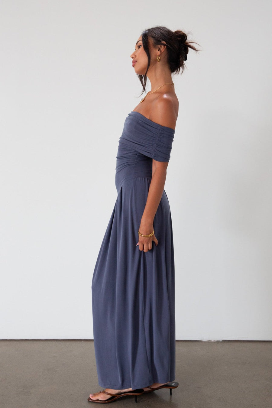 Knit maxi dress. Strapless elastic neckline. Off the shoulder short sleeves. Ruched sides. Unlined. Blue maxi dress. blue sleeveless maxi dress. Fold over dress. wedding guest dress. drop waist maxi dress