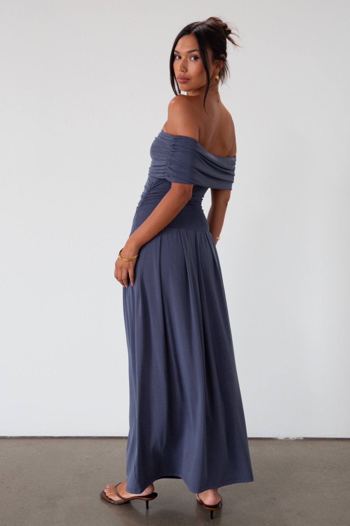 Knit maxi dress. Strapless elastic neckline. Off the shoulder short sleeves. Ruched sides. Unlined. Blue maxi dress. blue sleeveless maxi dress. Fold over dress. wedding guest dress. drop waist maxi dress