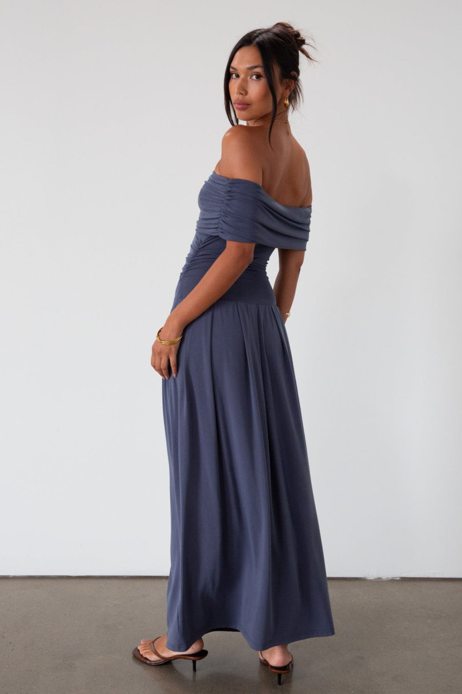 Knit maxi dress. Strapless elastic neckline. Off the shoulder short sleeves. Ruched sides. Unlined. Blue maxi dress. blue sleeveless maxi dress. Fold over dress. wedding guest dress. drop waist maxi dress