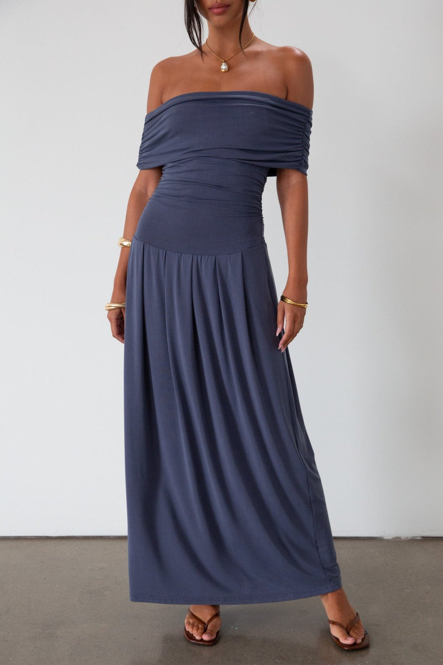 Knit maxi dress. Strapless elastic neckline. Off the shoulder short sleeves. Ruched sides. Unlined. Blue maxi dress. blue sleeveless maxi dress. Fold over dress. wedding guest dress. drop waist maxi dress