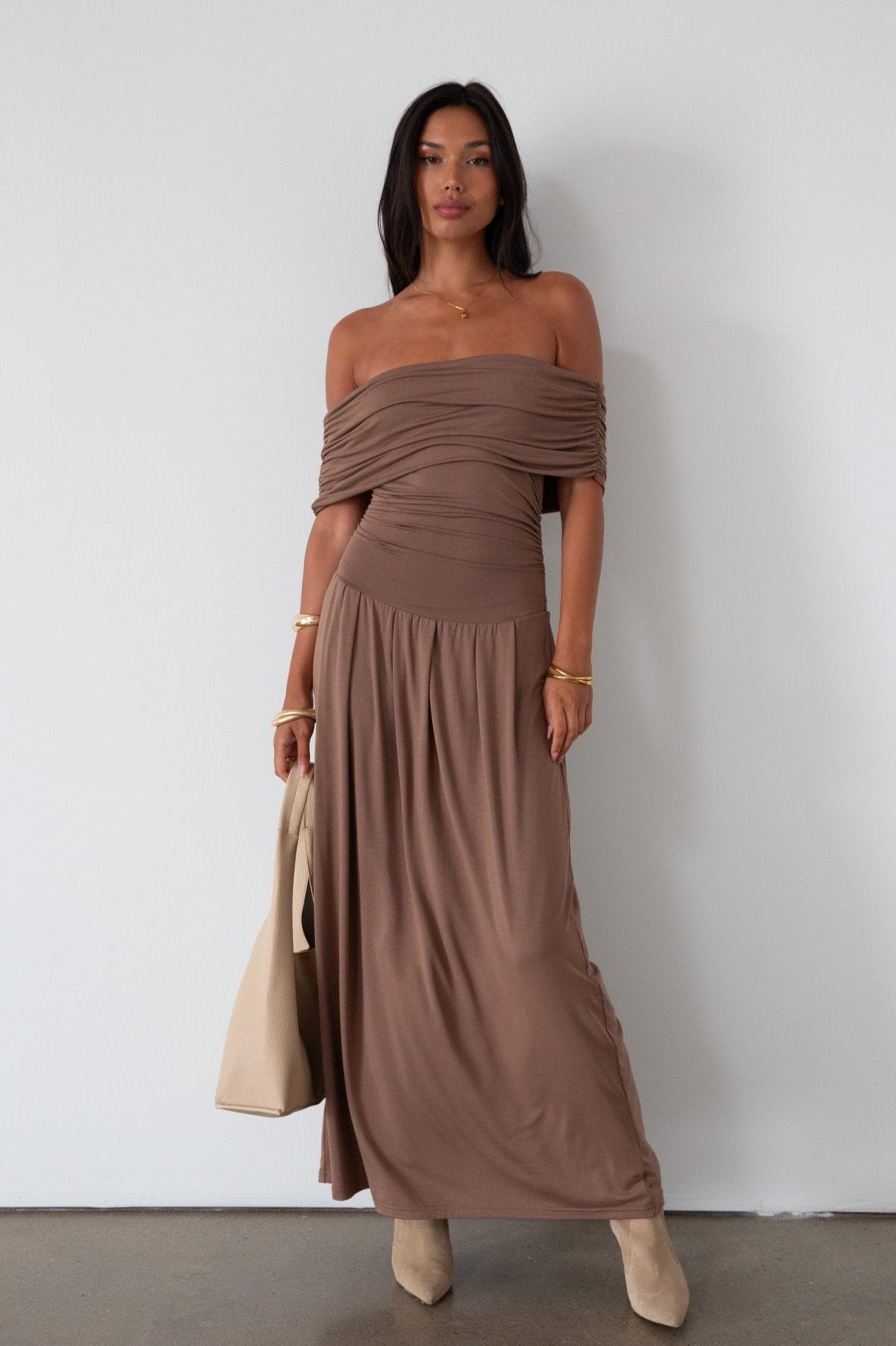 Knit maxi dress. Strapless elastic neckline. Off the shoulder short sleeves. Ruched sides. Unlined. brown maxi dress. brown sleeveless maxi dress. Fold over dress. wedding guest dress. drop waist maxi dress