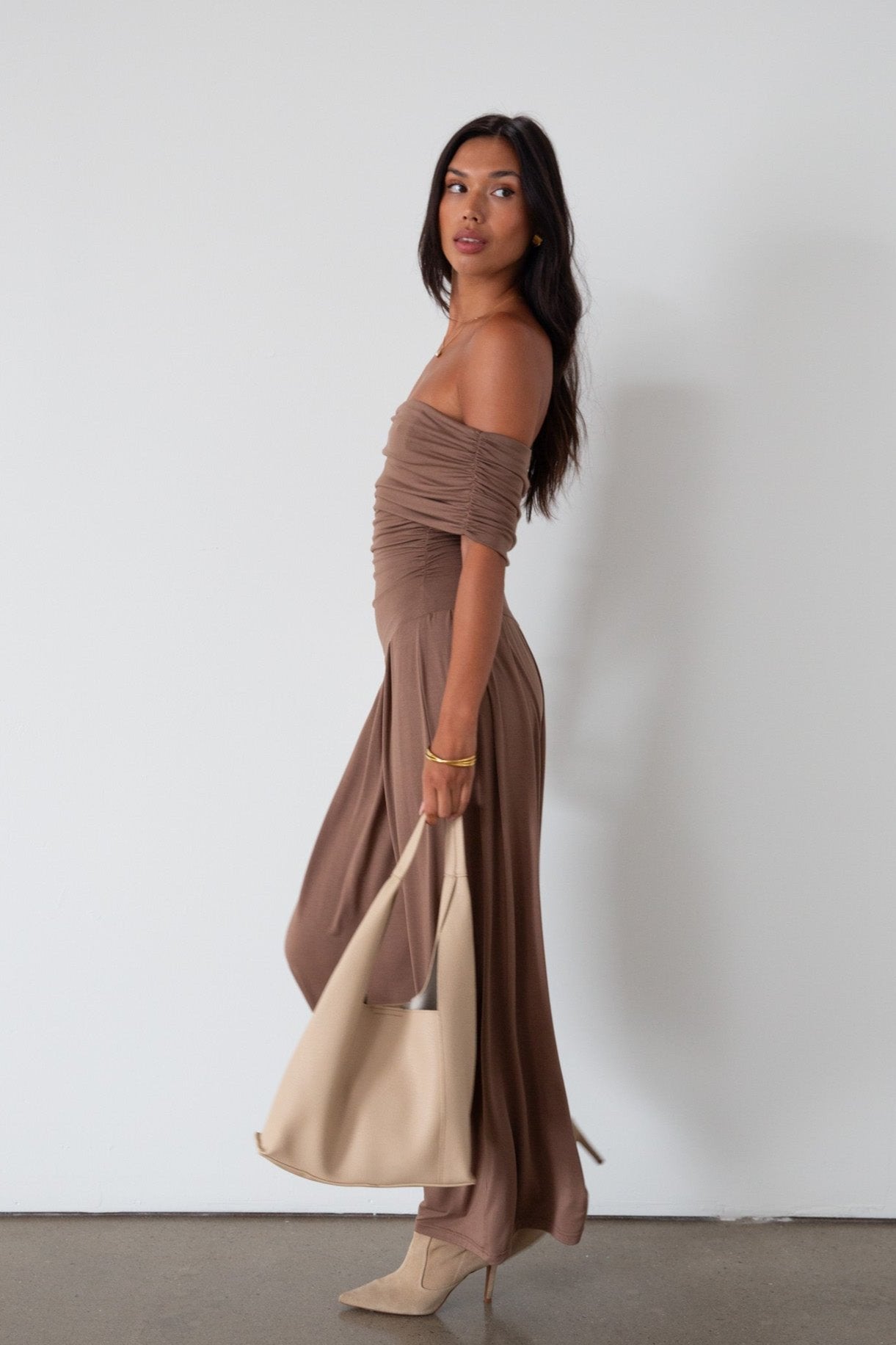 Knit maxi dress. Strapless elastic neckline. Off the shoulder short sleeves. Ruched sides. Unlined. brown maxi dress. brown sleeveless maxi dress. Fold over dress. wedding guest dress. drop waist maxi dress