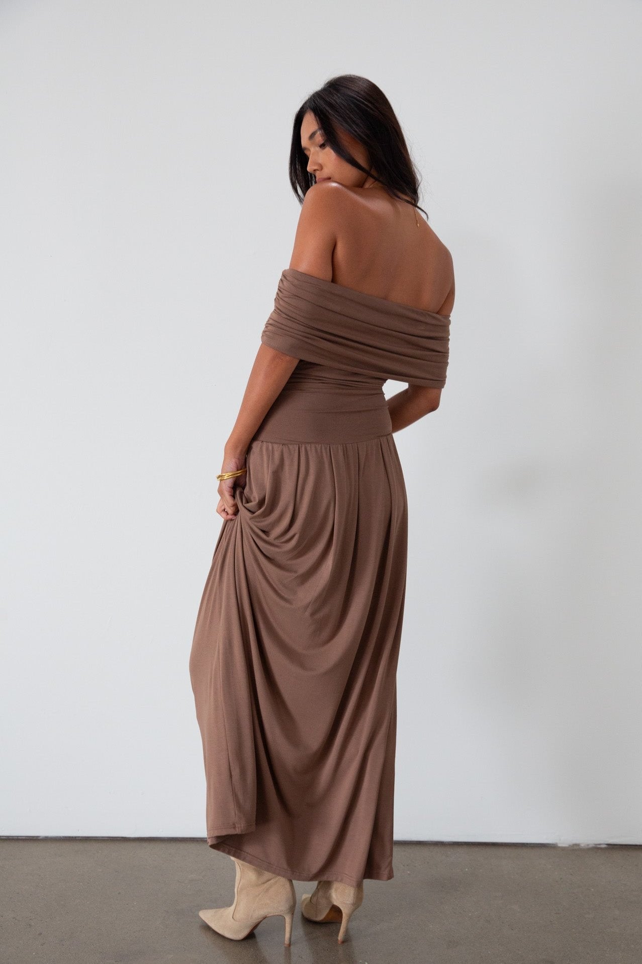 Knit maxi dress. Strapless elastic neckline. Off the shoulder short sleeves. Ruched sides. Unlined. brown maxi dress. brown sleeveless maxi dress. Fold over dress. wedding guest dress. drop waist maxi dress