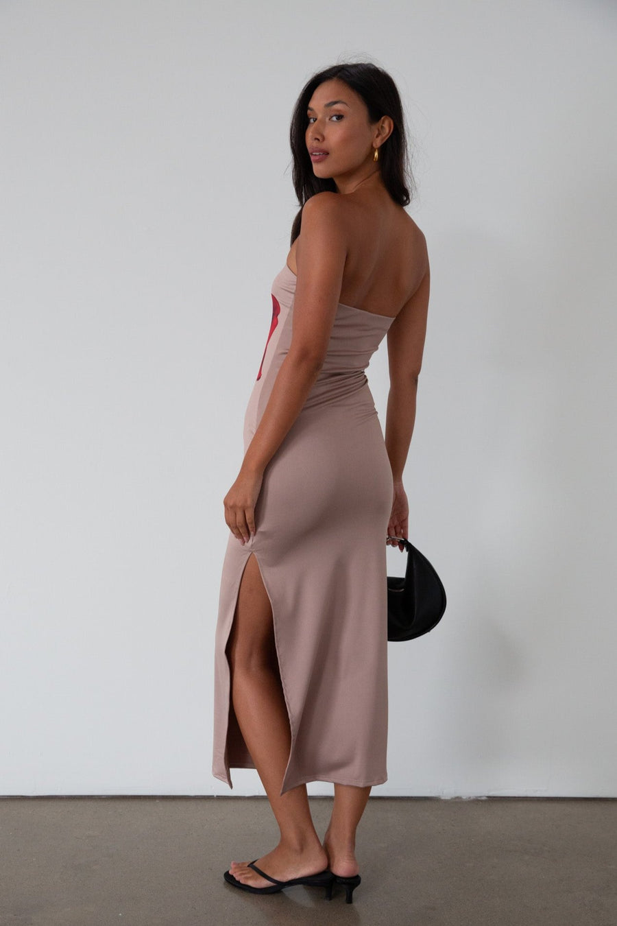Printed knit maxi dress. Strapless elastic neckline. Side slit. Unlined. rose maxi dress. rose mini dress. 