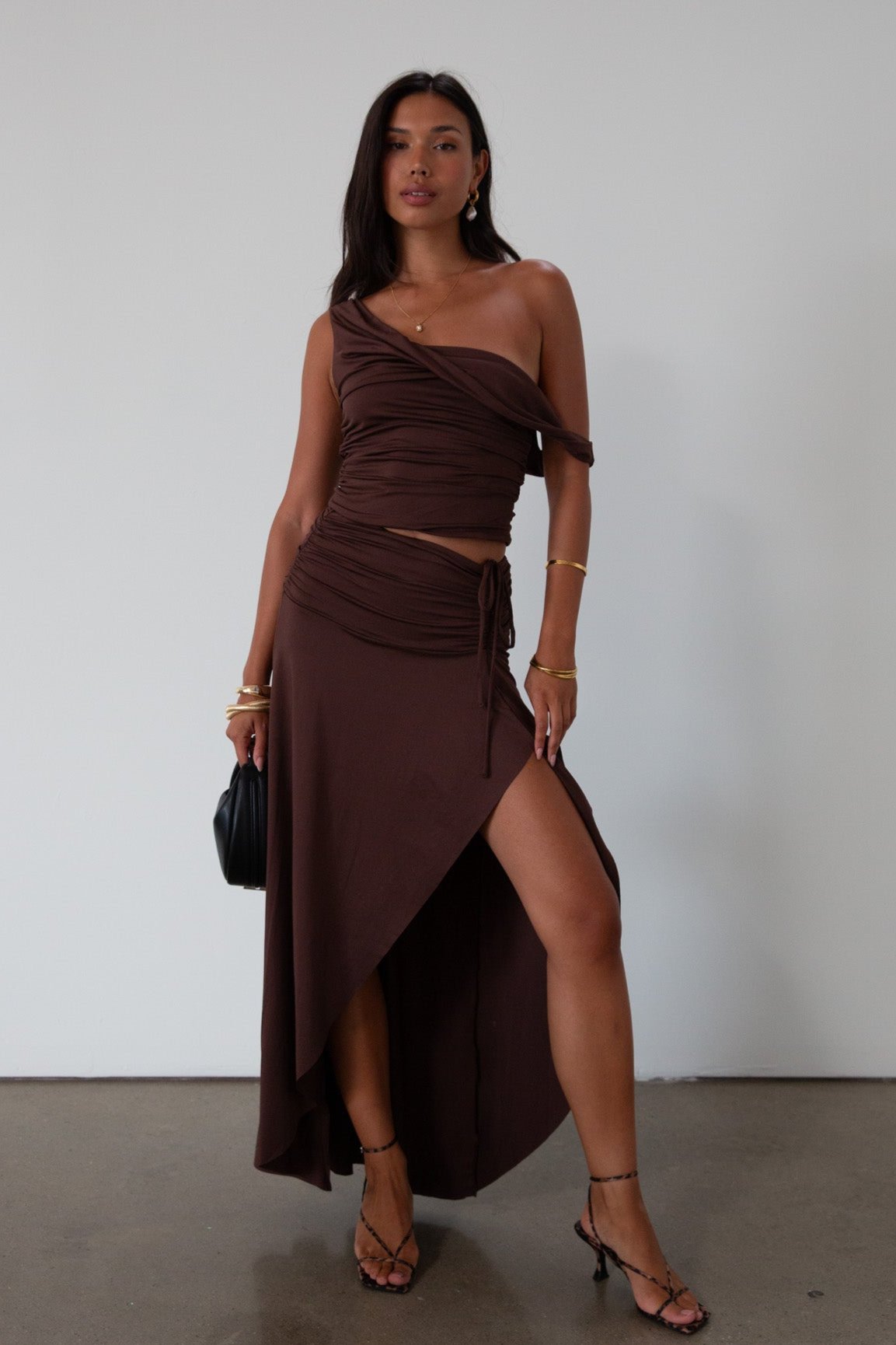Knit maxi skirt. Elastic waist. Front drawstring detail. Front slit. Unlined. Brown maxi skirt with slit. summer skirt. summer maxi skirt