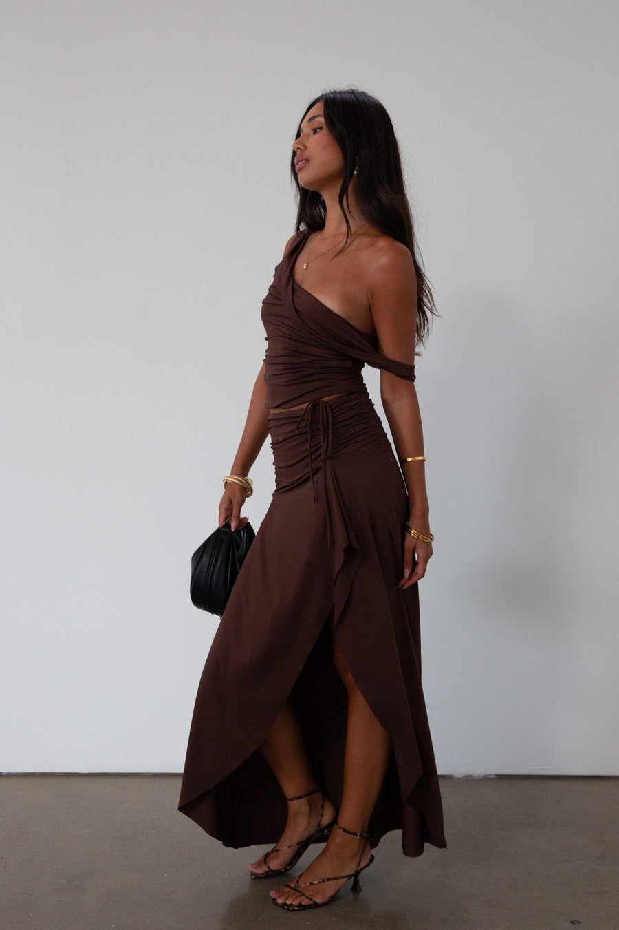 Knit maxi skirt. Elastic waist. Front drawstring detail. Front slit. Unlined. Brown maxi skirt with slit. summer skirt. summer maxi skirt