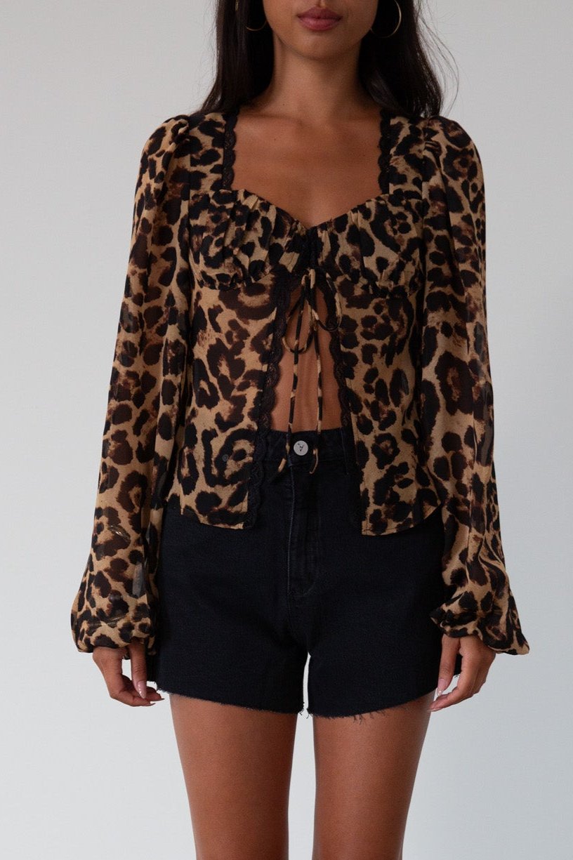 Denim shorts. Button and zipper fly. Five pocket construction. Raw hem. Unlined. black denim shorts