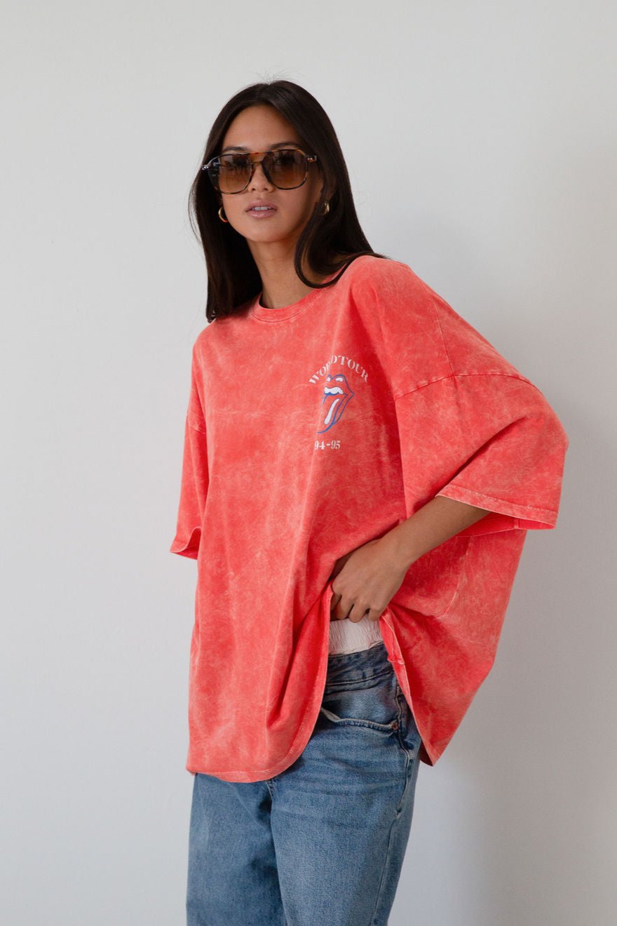 Graphic printed acid wash knit oversized tee. Crewneck. Short sleeves. rolling stones graphic tee
