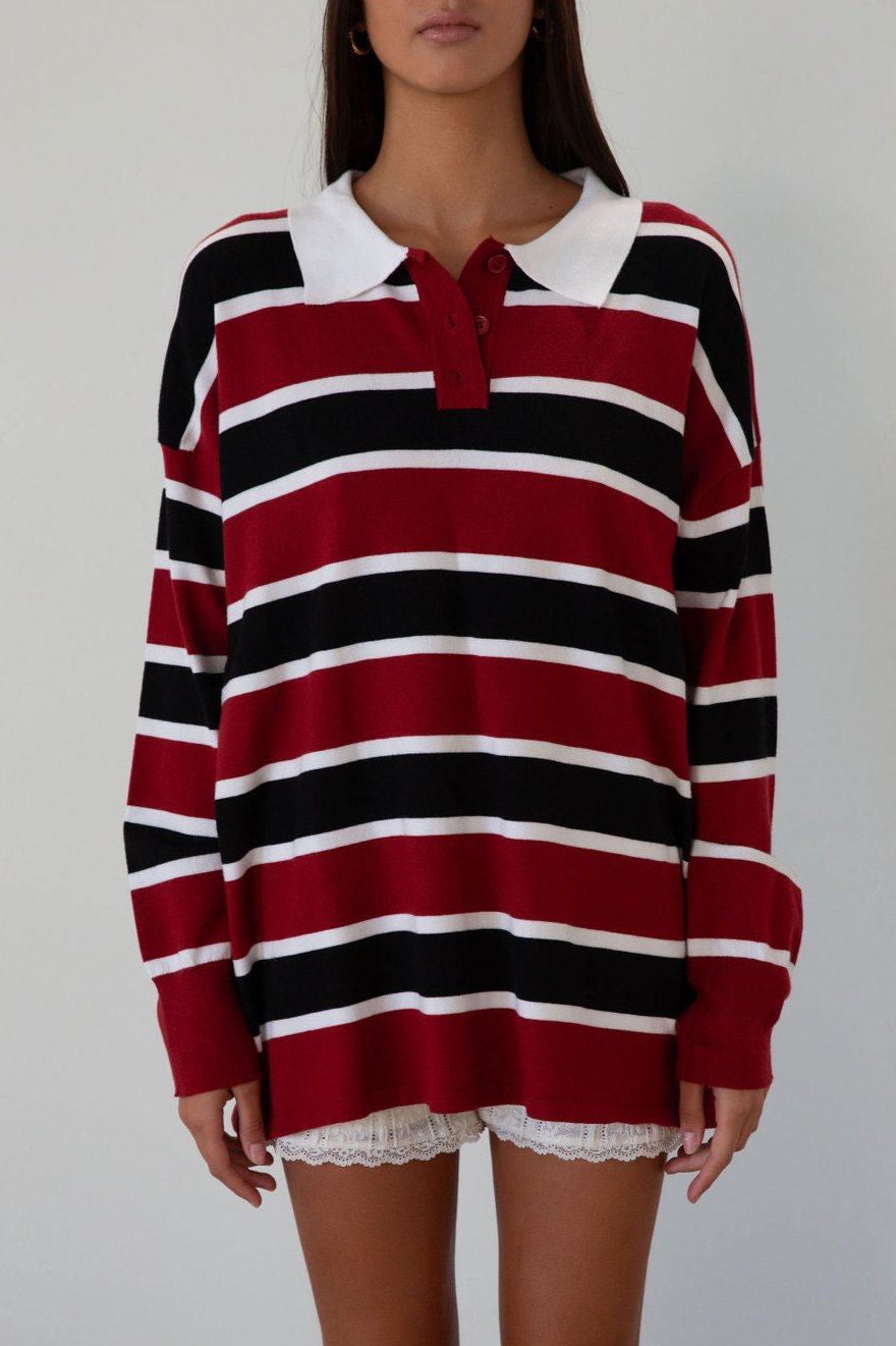 Striped knit top. Collar neckline. Front button closures. Long sleeves. Unlined. striped polo long sleeve. fall transition outfit. 