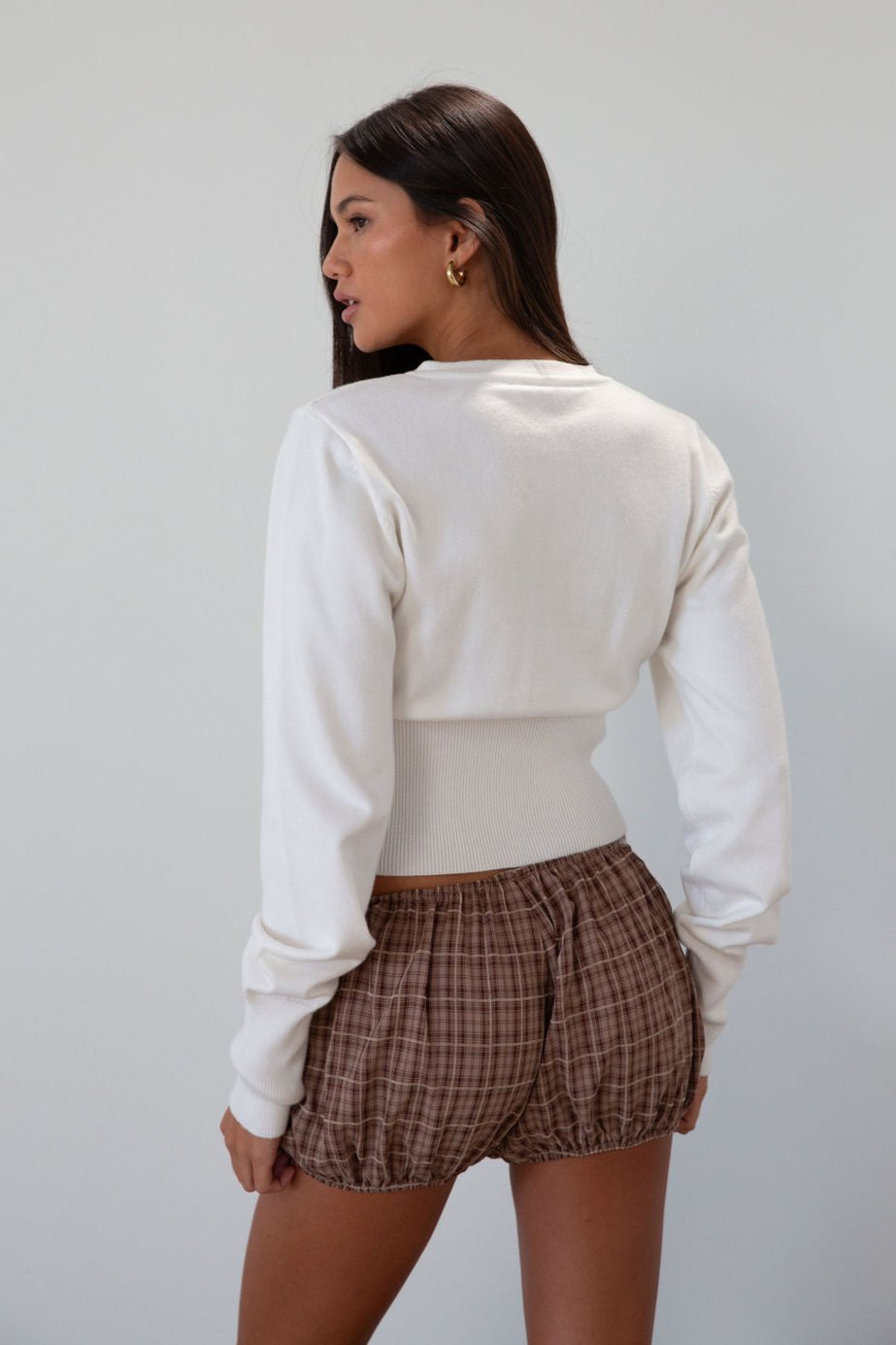 Plaid woven shorts. Elastic waist and leg openings. Unlined.&amp;nbsp;