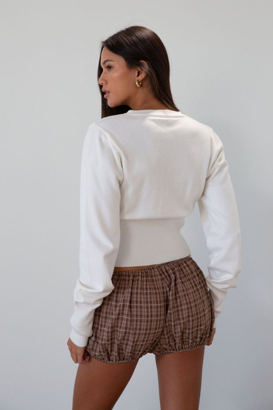 Plaid woven shorts. Elastic waist and leg openings. Unlined.&nbsp;