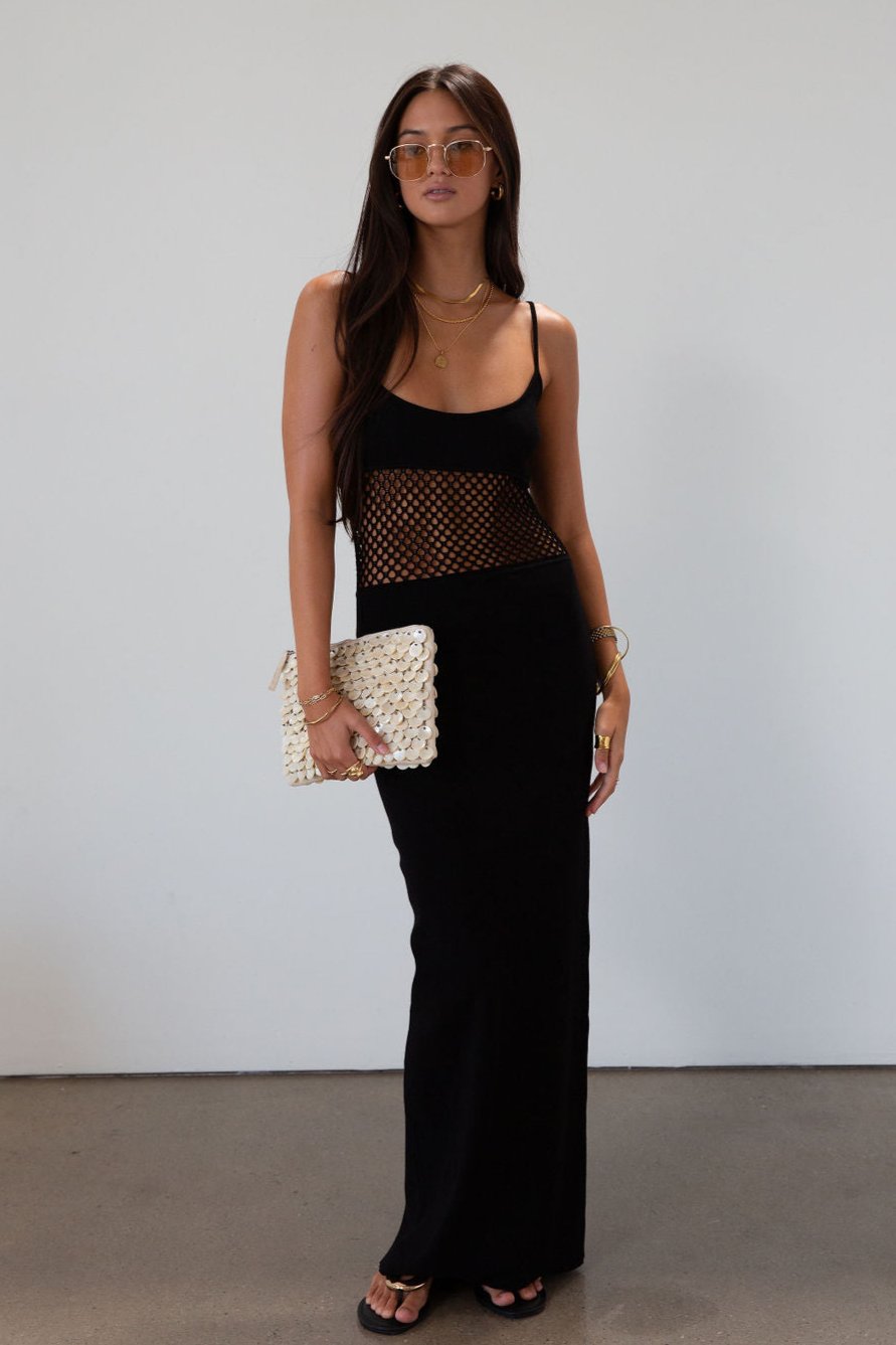 Ribbed knit maxi dress. Adjustable straps. Net mesh waist panel. Unlined. resort wear. resort dress. vacation dress. fancy dinner dress. black maxi dress