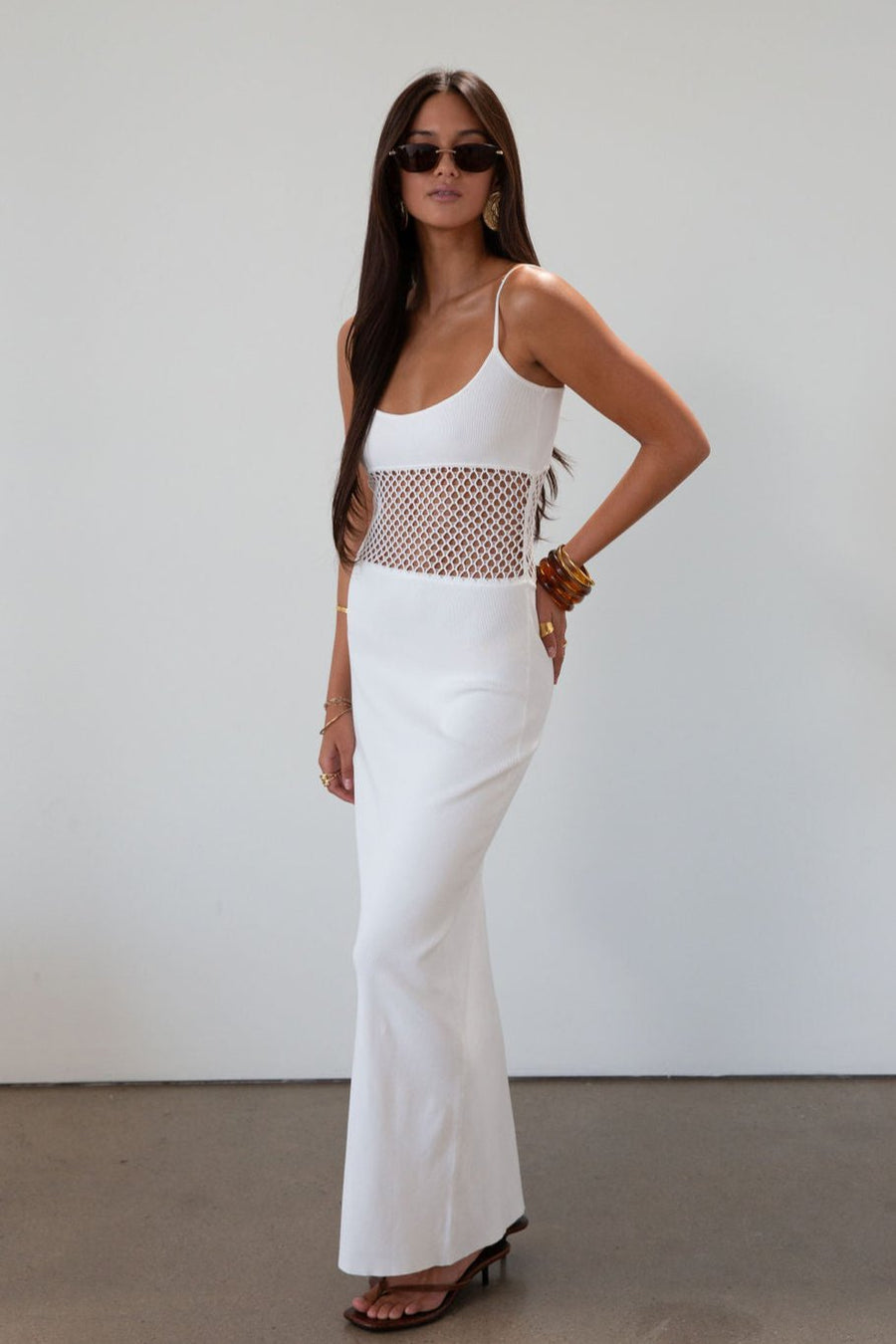 Ribbed knit maxi dress. Adjustable straps. Net mesh waist panel. Unlined. resort wear. resort dress. white maxi dress. vacation dress. fancy dinner dress