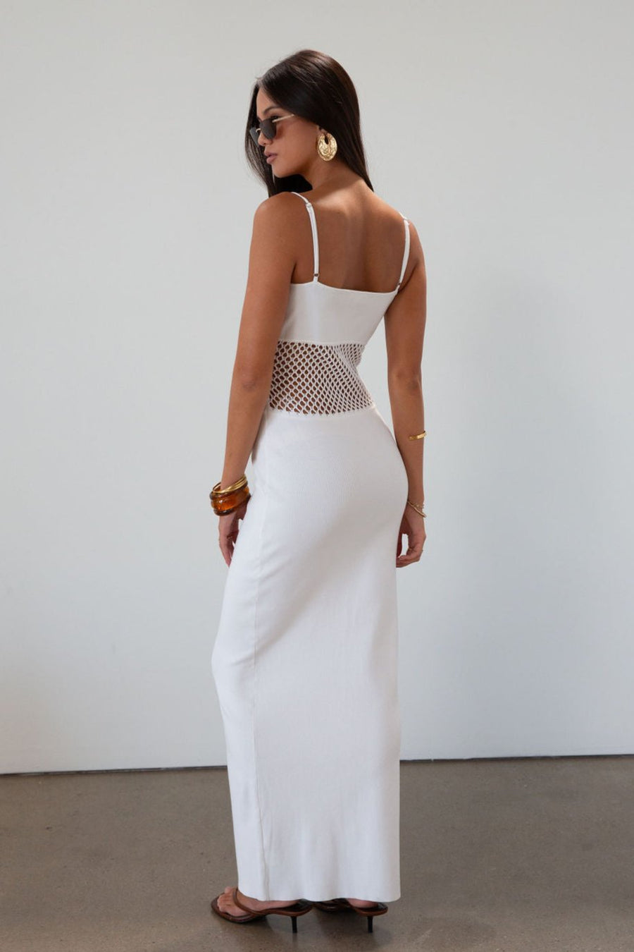 Ribbed knit maxi dress. Adjustable straps. Net mesh waist panel. Unlined. resort wear. resort dress. white maxi dress. vacation dress. fancy dinner dress