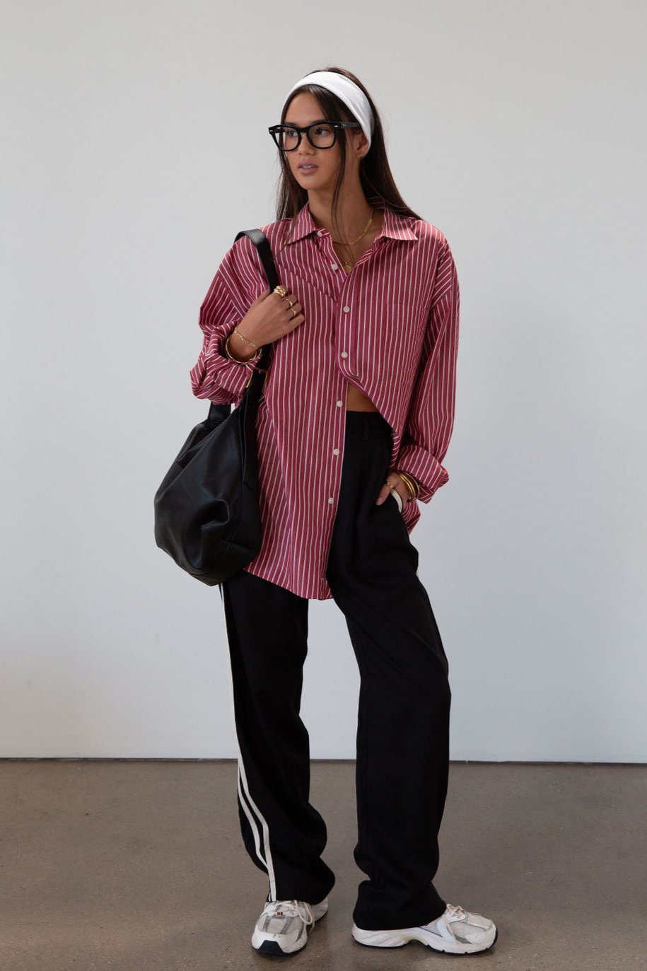 Striped woven pants. Button and zipper fly. Side pockets. Elastic back waist. Unlined.