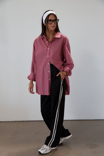 Striped woven pants. Button and zipper fly. Side pockets. Elastic back waist. Unlined.