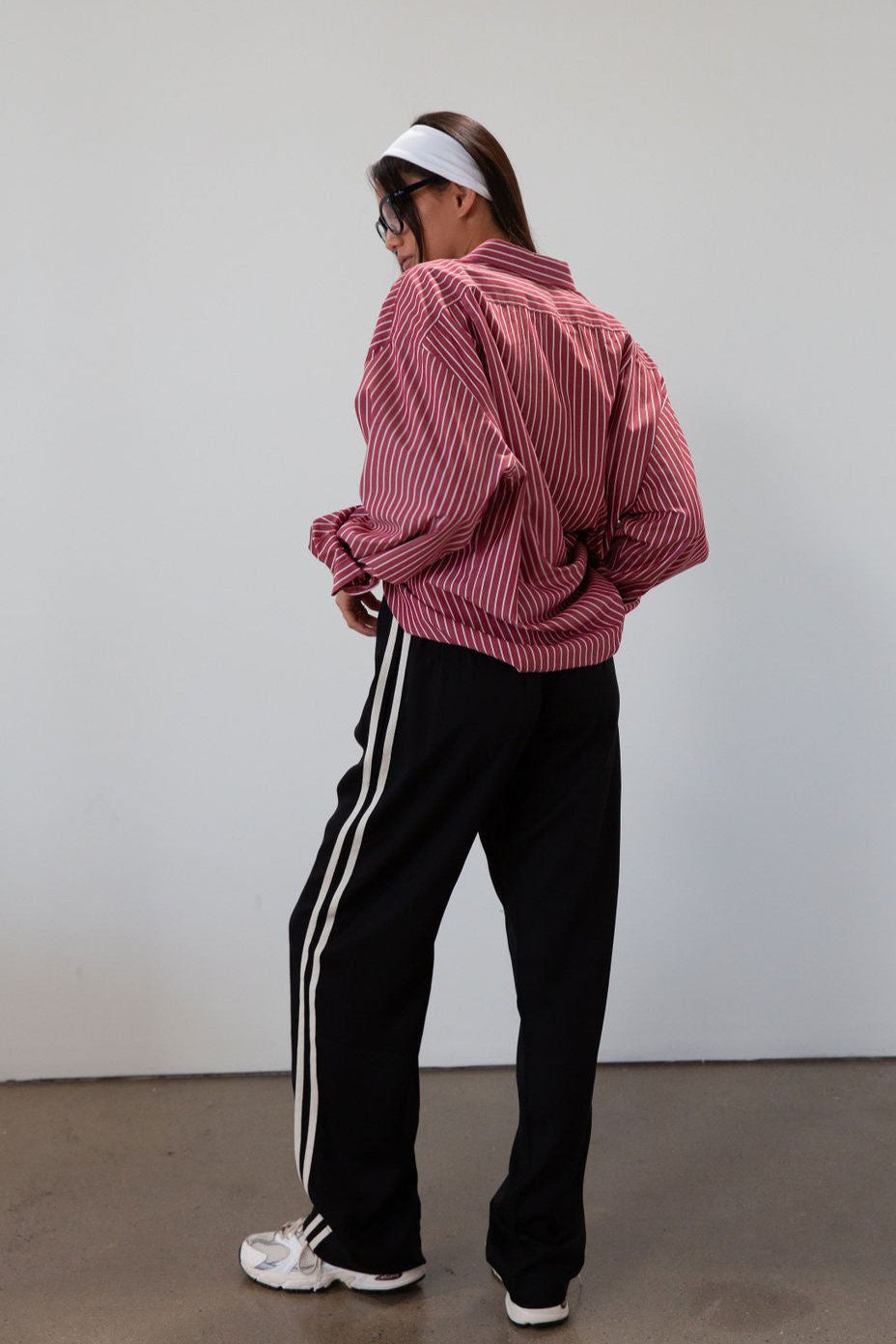 Striped woven pants. Button and zipper fly. Side pockets. Elastic back waist. Unlined.