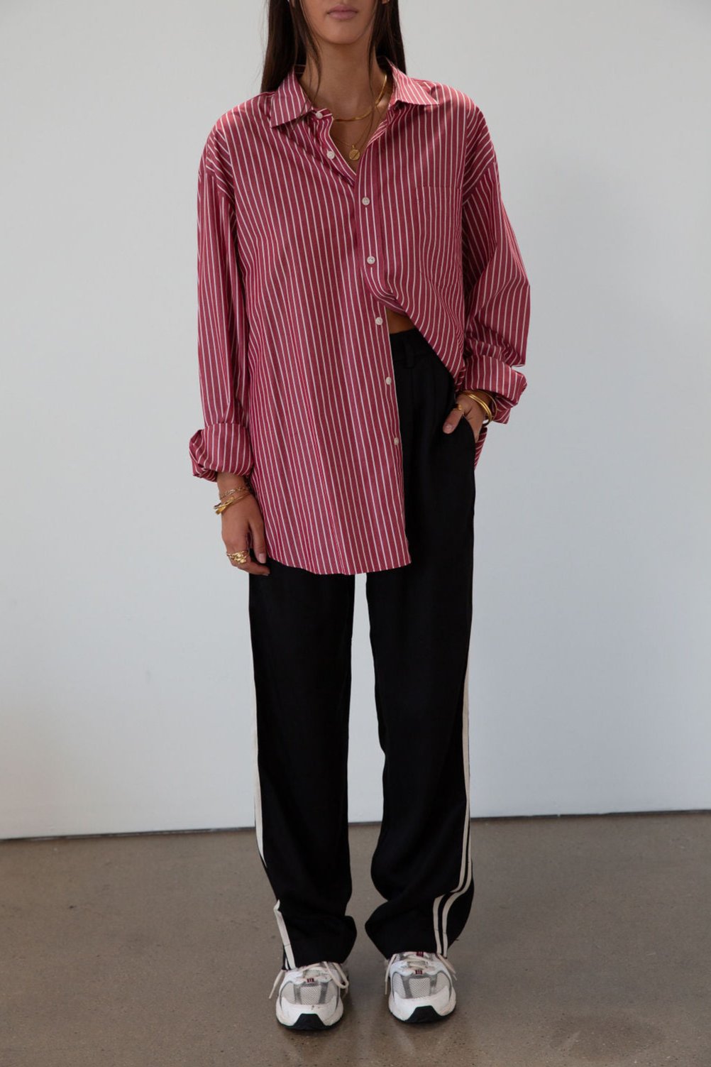 Striped woven pants. Button and zipper fly. Side pockets. Elastic back waist. Unlined.