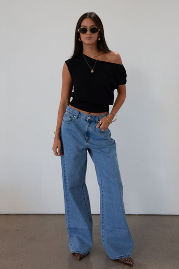 Baggy jeans. Button and zipper fly. Five pocket construction. Unlined.