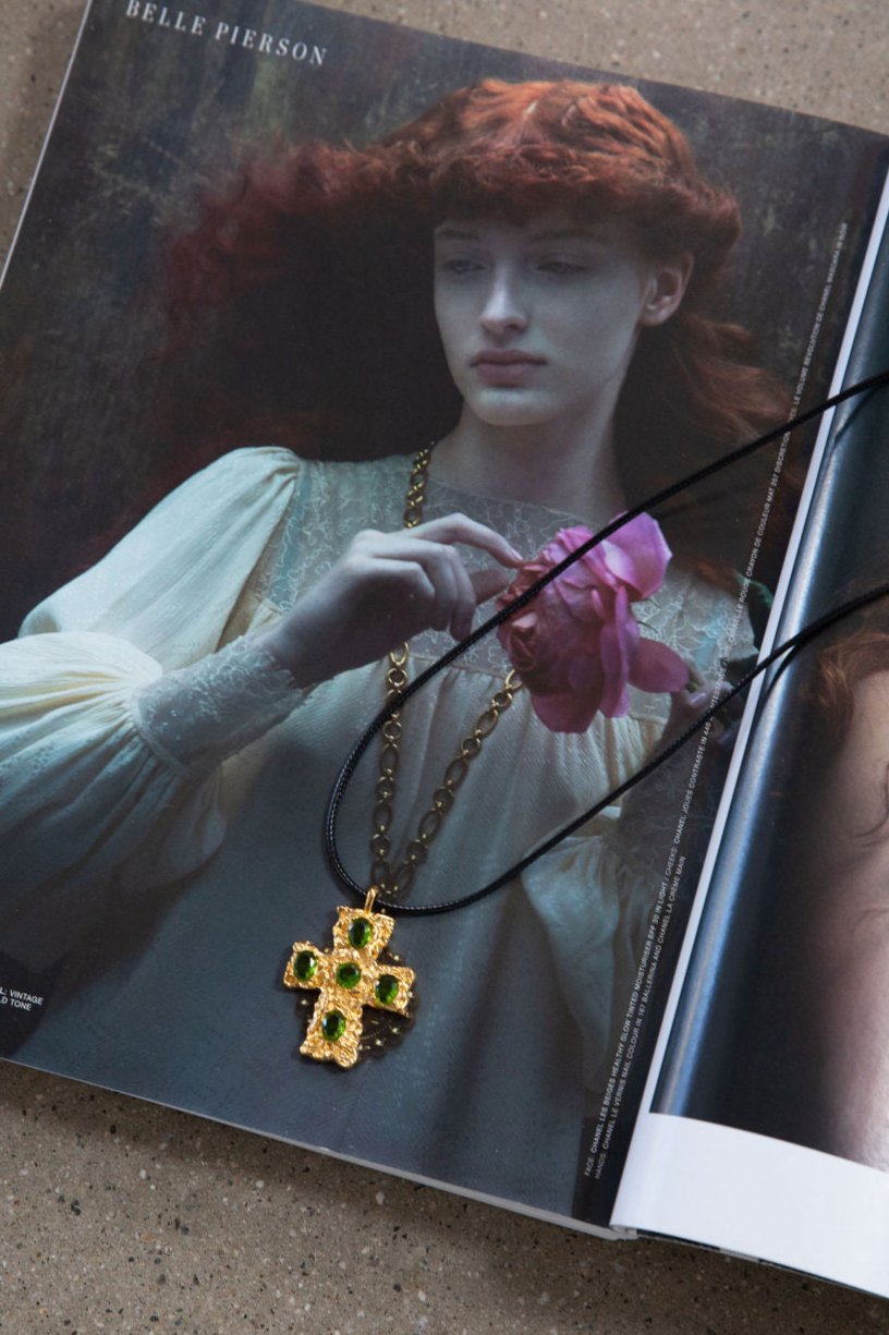 Green zircon 18k gold plated non-tarnish cross charm necklace. Adjustable rope necklace with lobster clasp.&nbsp;