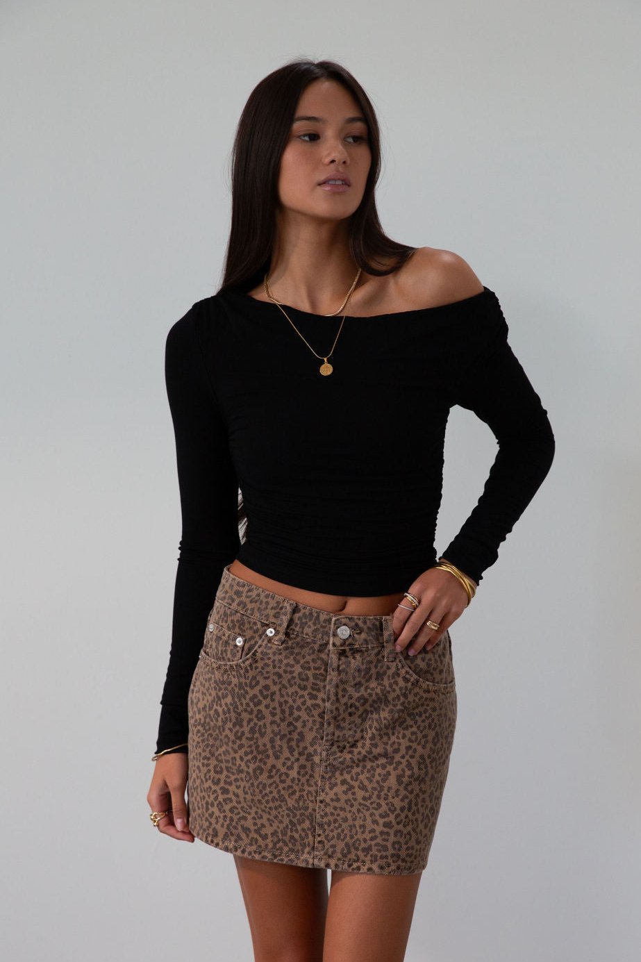 Knit crop top. Long sleeves. Ruched sides. Fully lined. black off the shoulder top. going out top. black long sleeve
