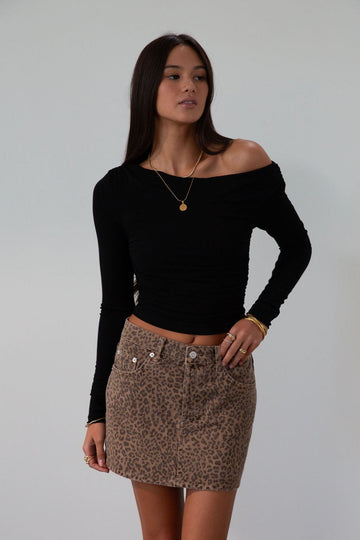 Knit crop top. Long sleeves. Ruched sides. Fully lined. black off the shoulder top. going out top. black long sleeve