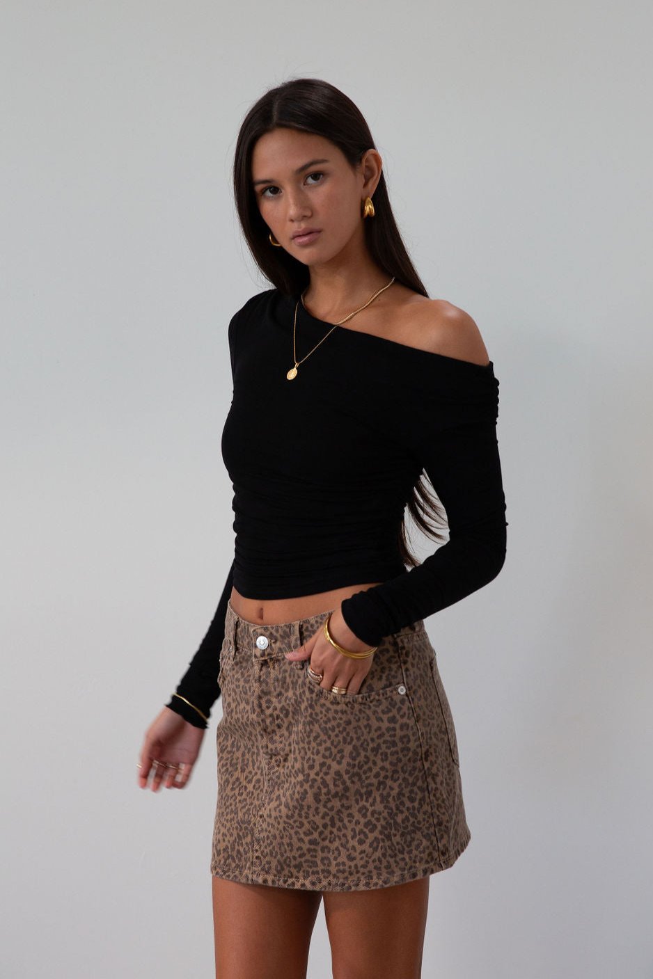 Knit crop top. Long sleeves. Ruched sides. Fully lined. black off the shoulder top. going out top. black long sleeve