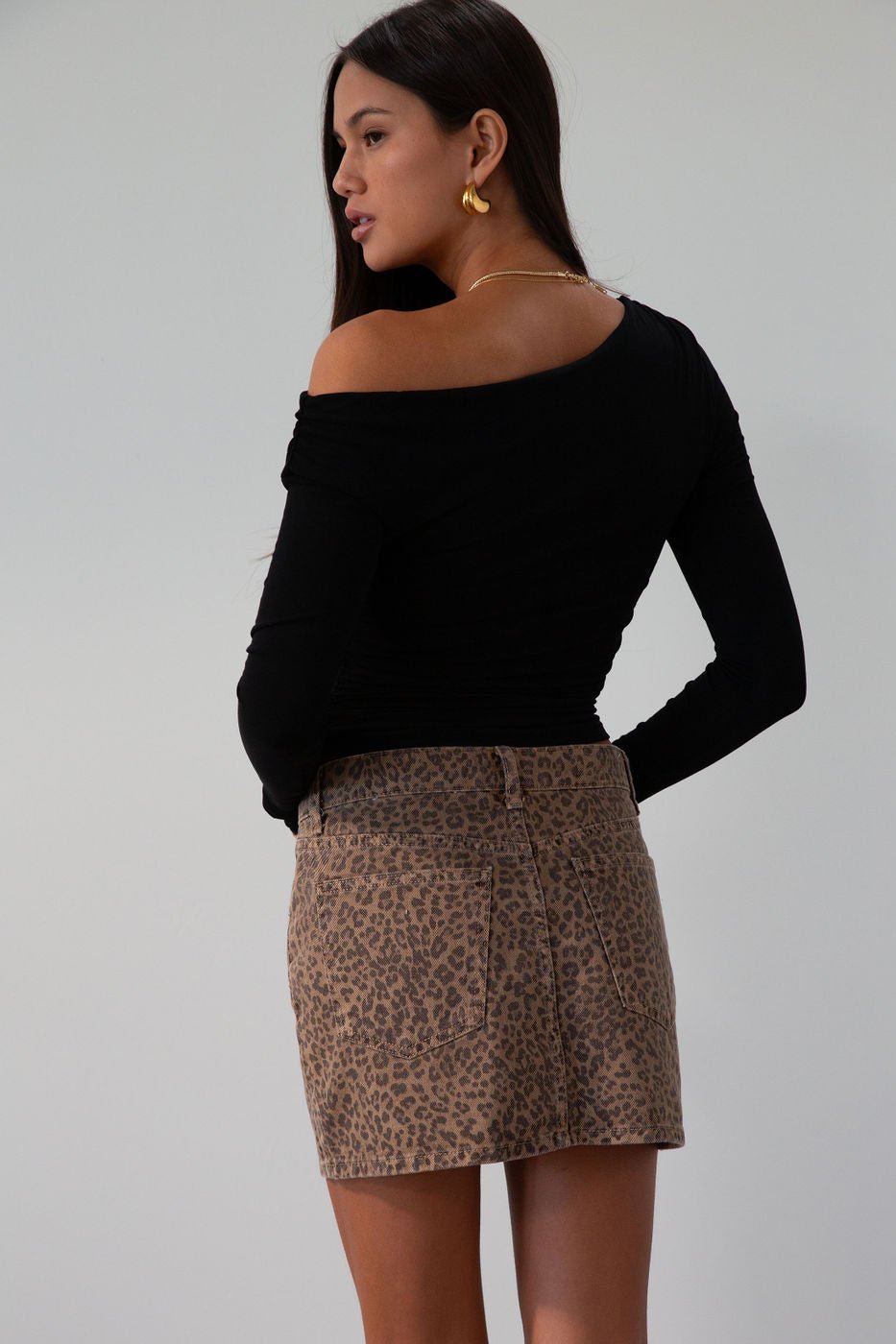 Knit crop top. Long sleeves. Ruched sides. Fully lined. black off the shoulder top. going out top. black long sleeve