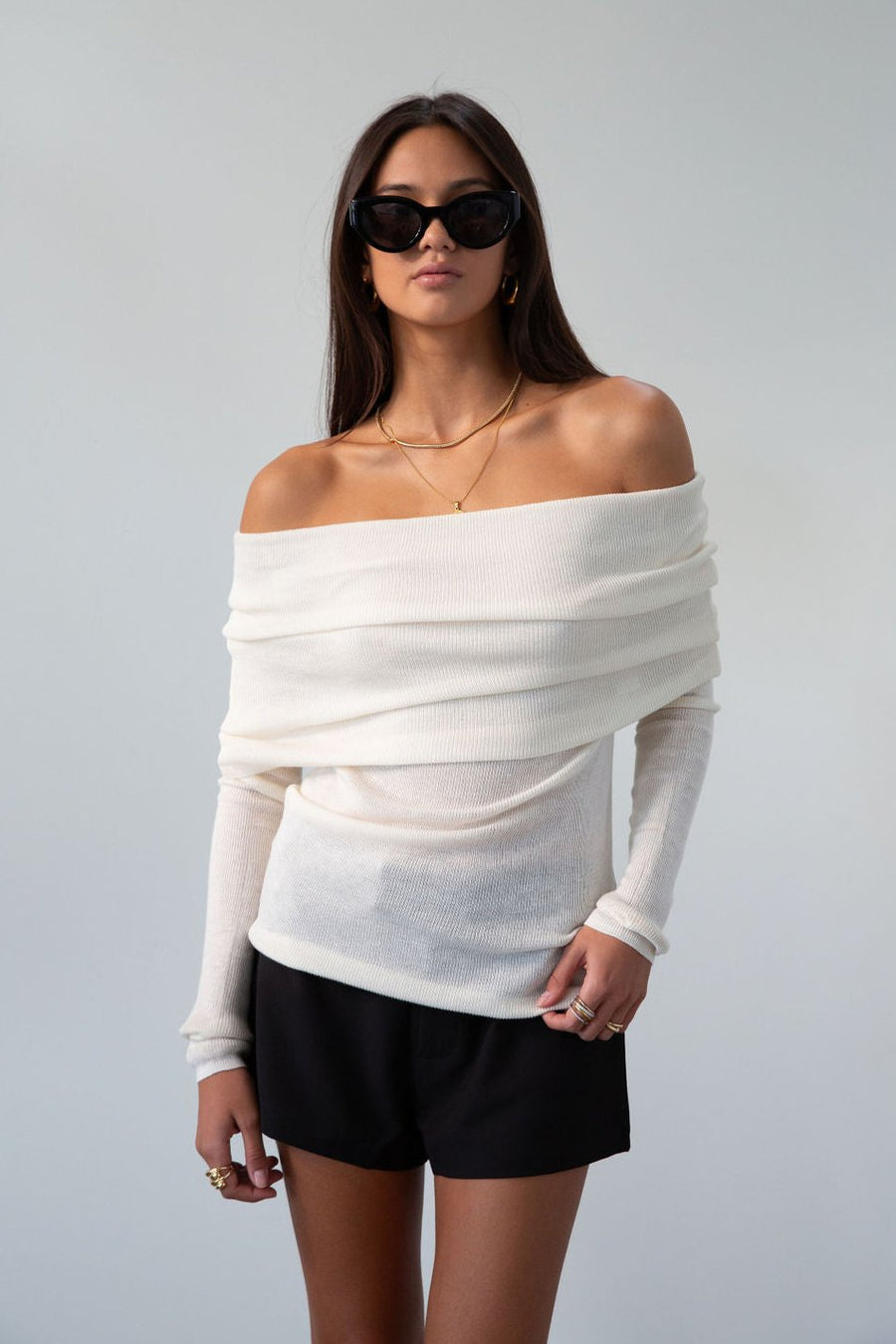 Ivory Ribbed knit sweater. Folded off the shoulder neckline. Long sleeves. Unlined. cream sweater. white sweater. fall outfit