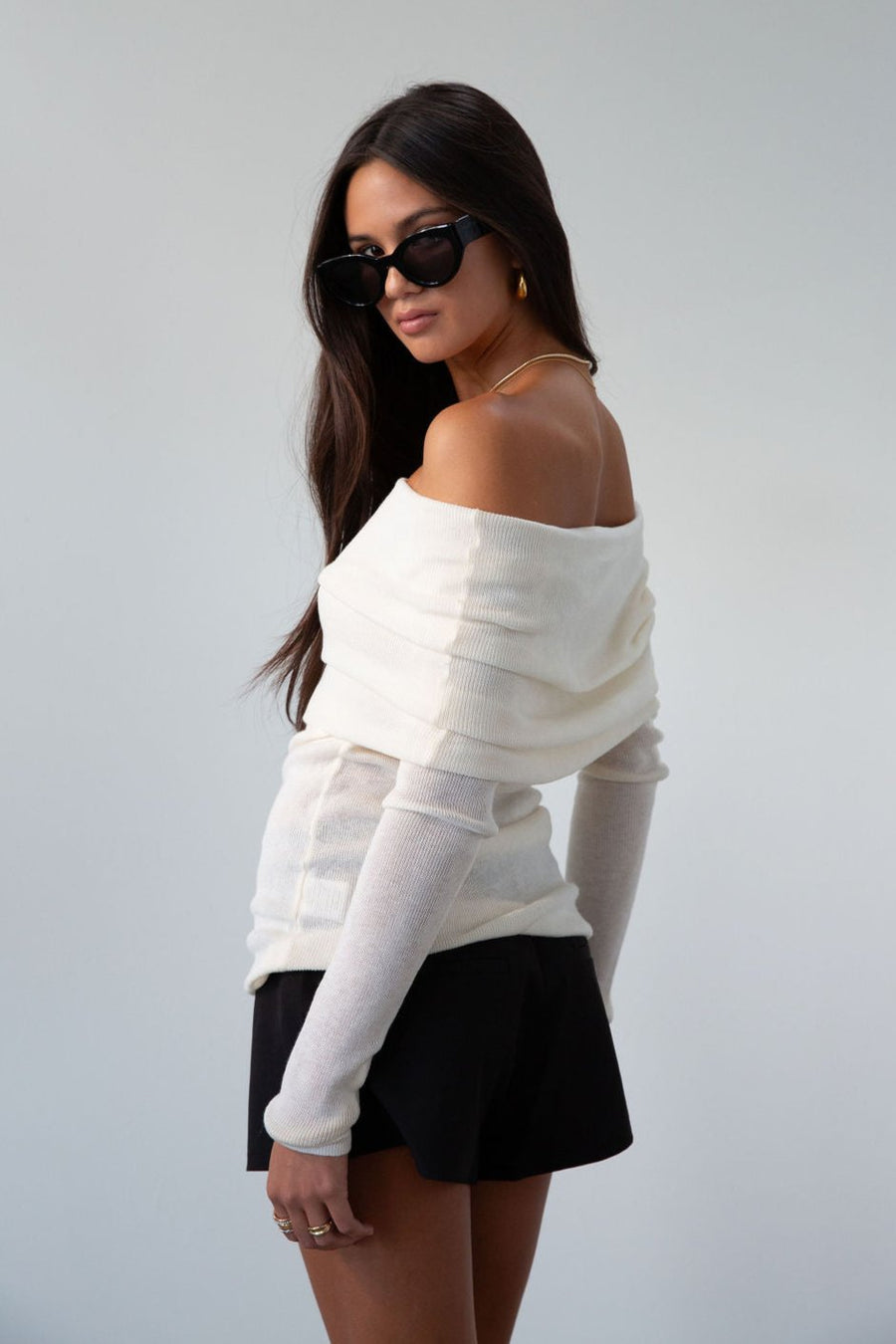 Ivory Ribbed knit sweater. Folded off the shoulder neckline. Long sleeves. Unlined. cream sweater. white sweater. fall outfit