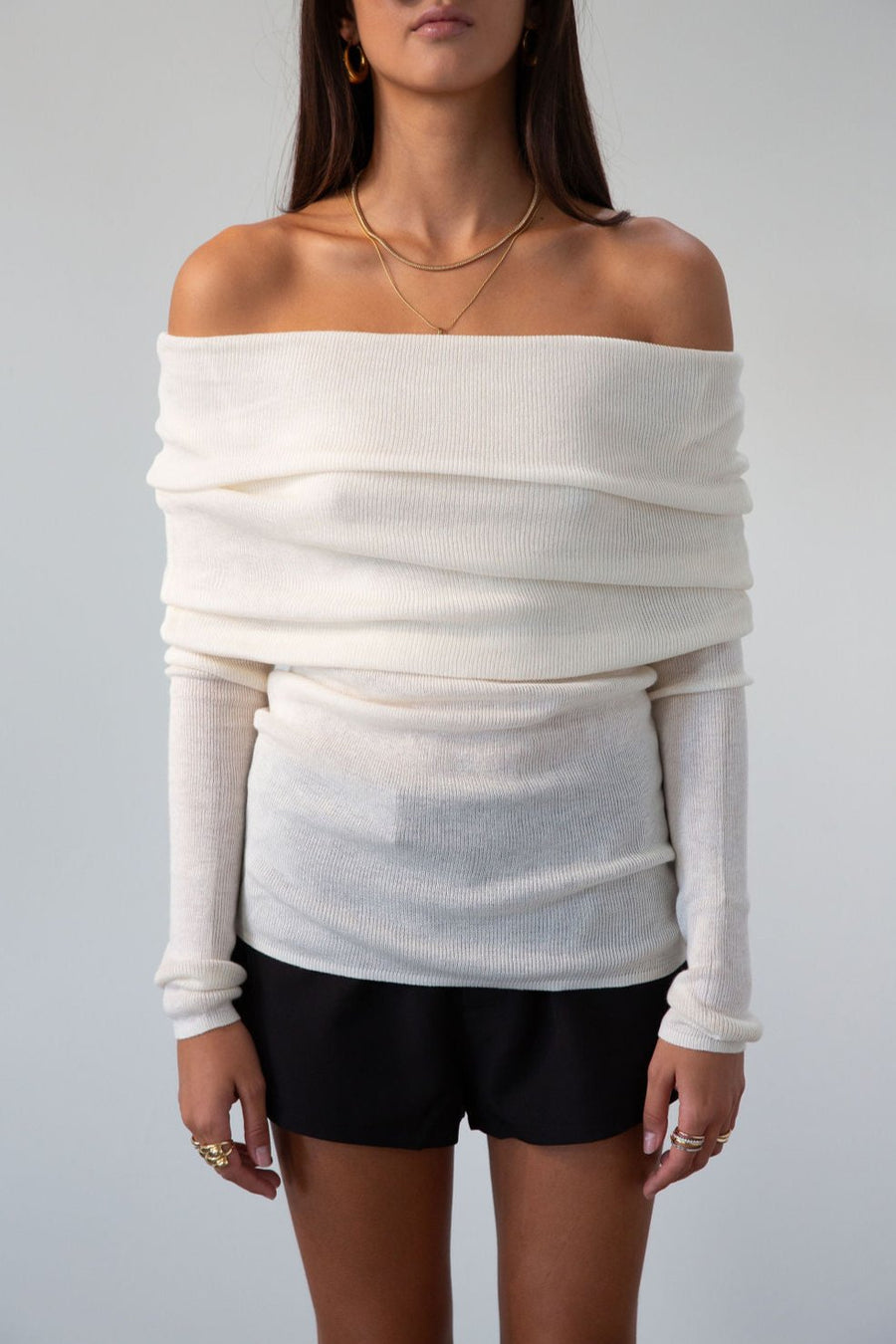 Ivory Ribbed knit sweater. Folded off the shoulder neckline. Long sleeves. Unlined. cream sweater. white sweater. fall outfit