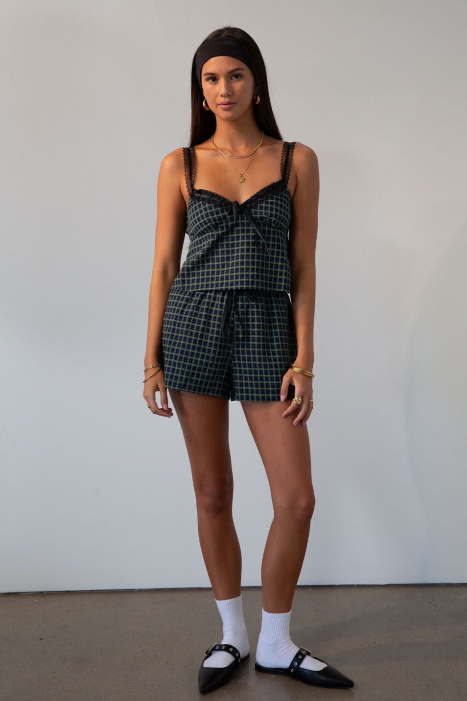 green Checkered woven cropped tank. Lace trim. Adjustable straps. Front tie. Elastic back. Partially lined. fall outfit