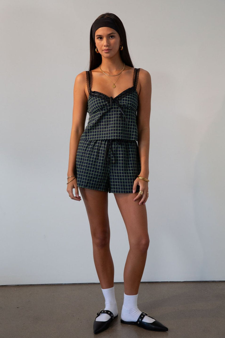 green Checkered woven shorts. Lace trim. Elastic waistband. Tie waist. Back pockets. Fully lined. fall outfit