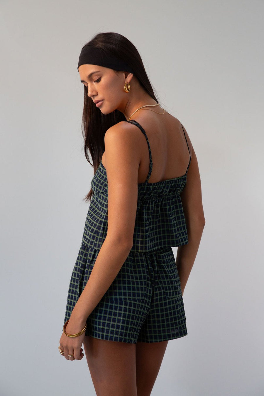 green Checkered woven shorts. Lace trim. Elastic waistband. Tie waist. Back pockets. Fully lined. fall outfit