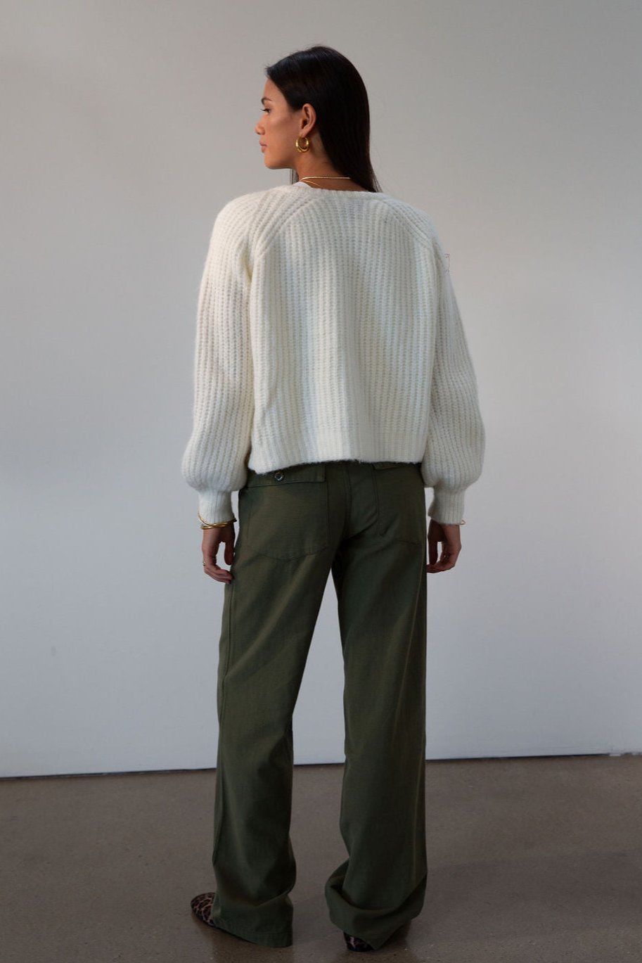 Woven utility pants. Button fly. Four pocket construction. Unlined. green pants. fall outfit.