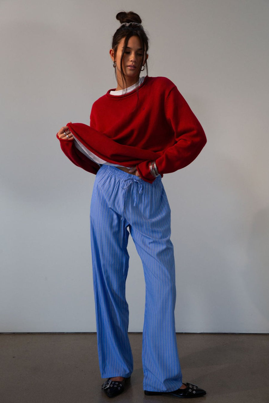 Striped woven pants. Elastic waistband with drawstring closure. Side pockets. Unlined. blue boxer pants. fall outfit. cute loungewear. 
