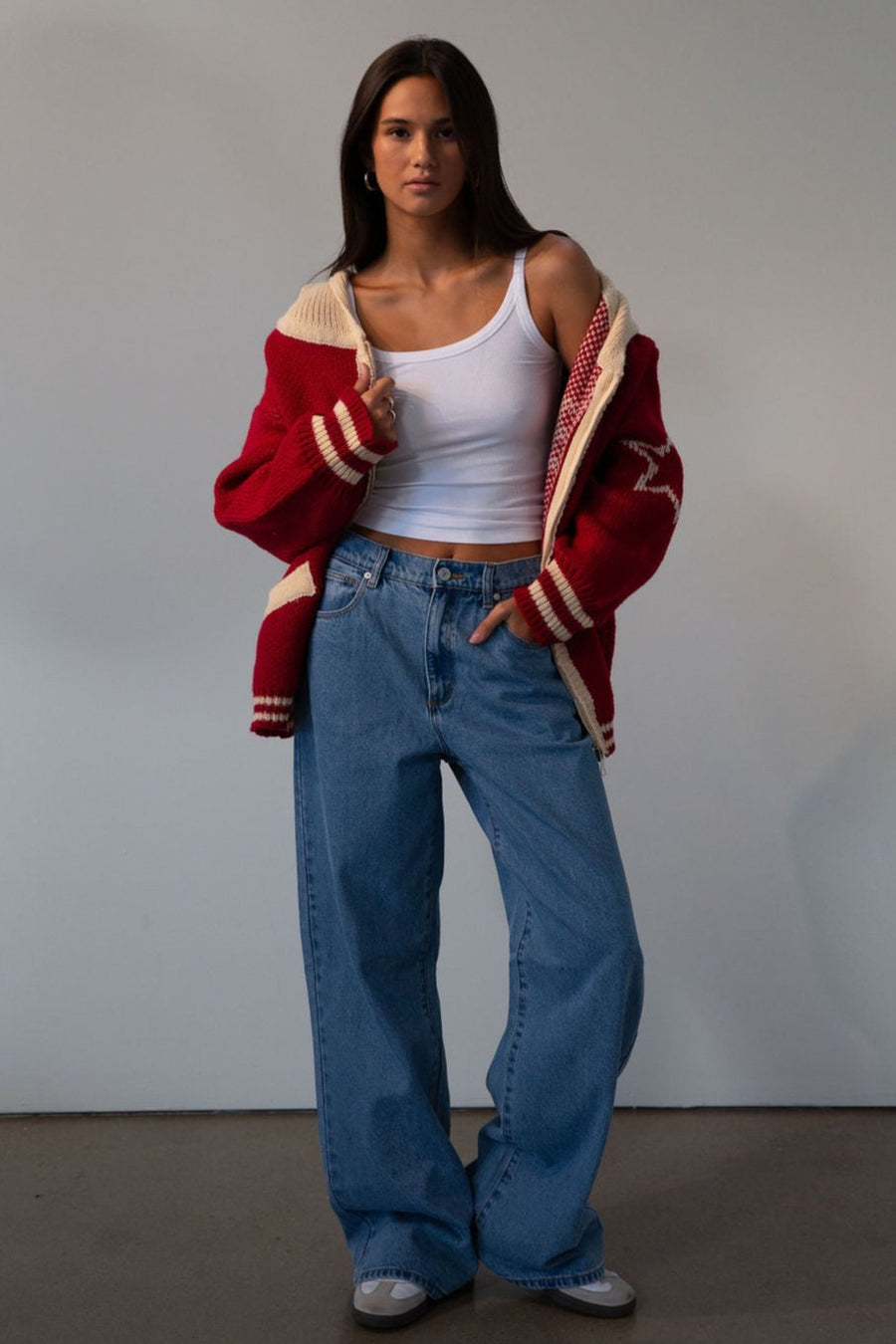 Fuzzy crochet knit sweater. Hoodie. Exposed front zipper closure. Front pockets. Unlined. red sweater. fall outfit. red zip up sweater