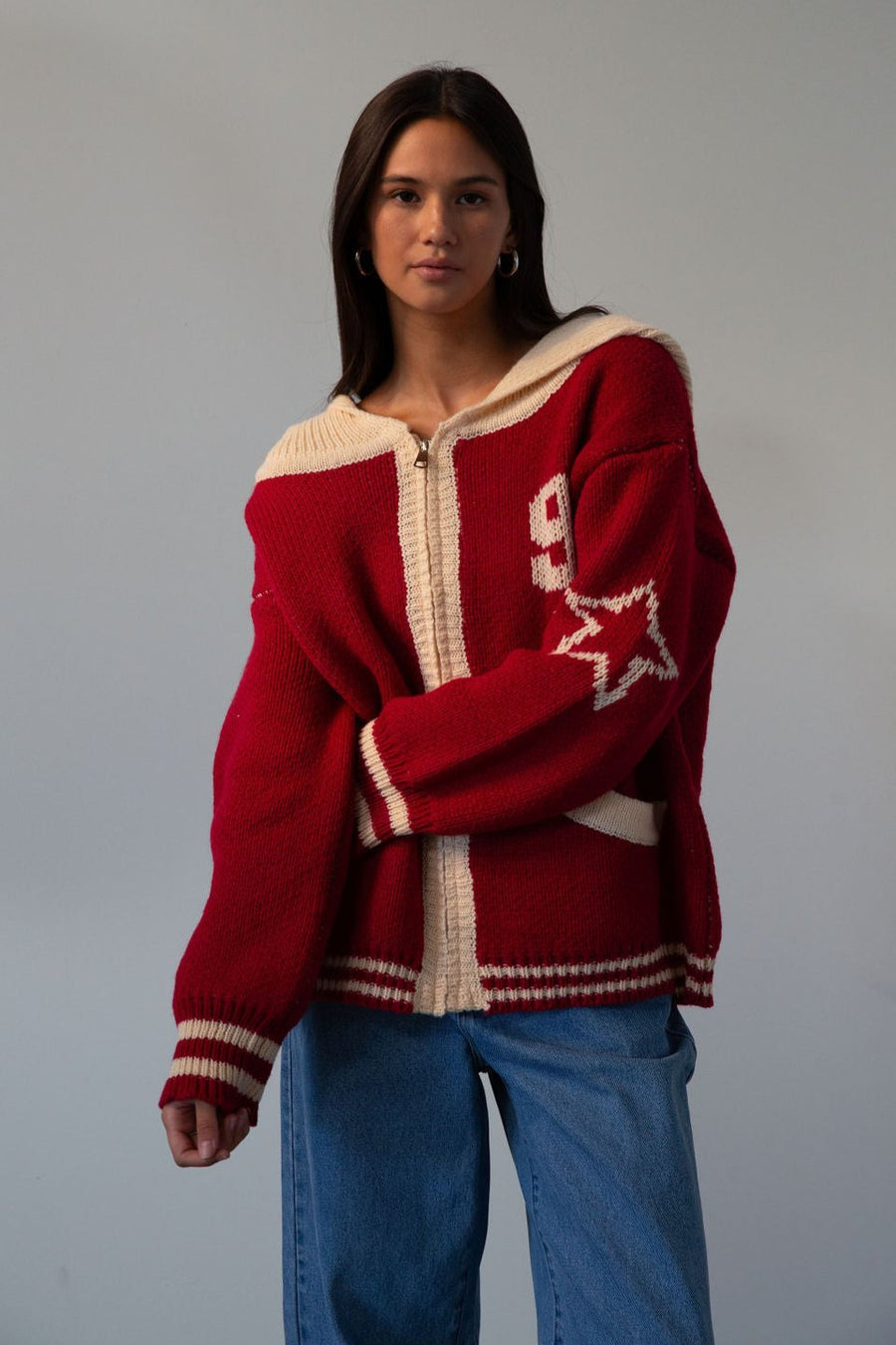 Fuzzy crochet knit sweater. Hoodie. Exposed front zipper closure. Front pockets. Unlined. red sweater. fall outfit. red zip up sweater