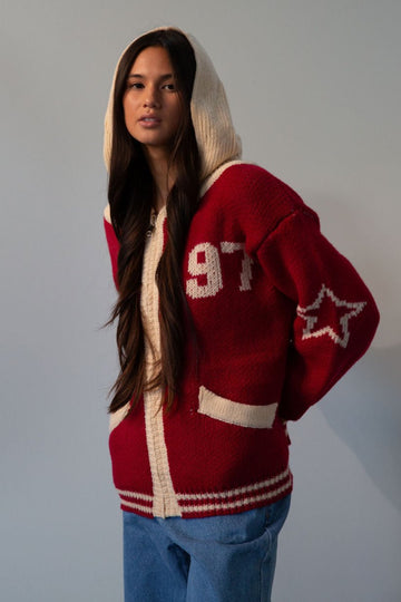 Fuzzy crochet knit sweater. Hoodie. Exposed front zipper closure. Front pockets. Unlined. red sweater. fall outfit. red zip up sweater