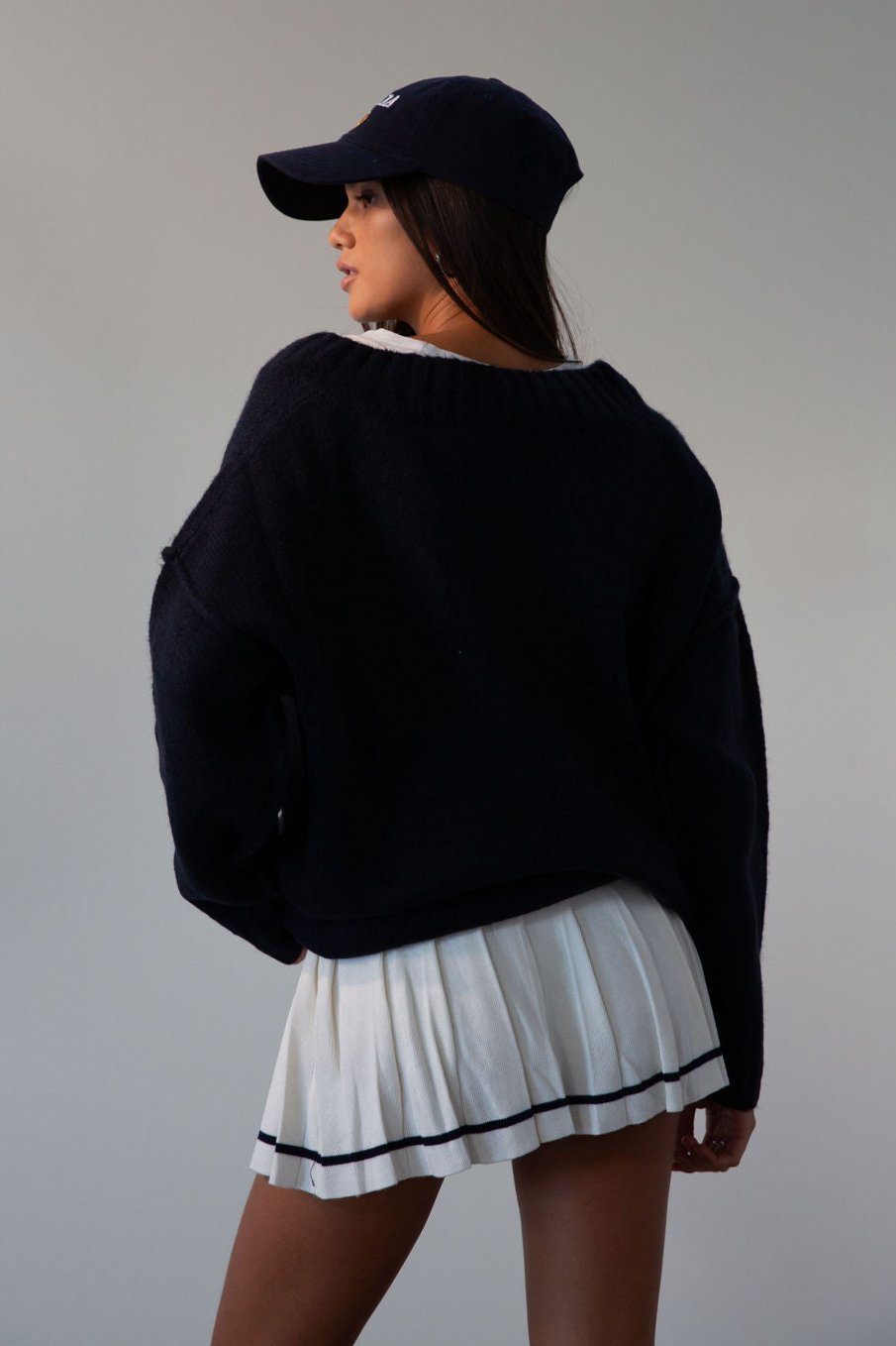 Pleated knit skirt. Elastic waistband. Shorts lining. white skirt. tennis skirt. fashion tennis skirt. preppy skirt. preppy outfit. fall outfit