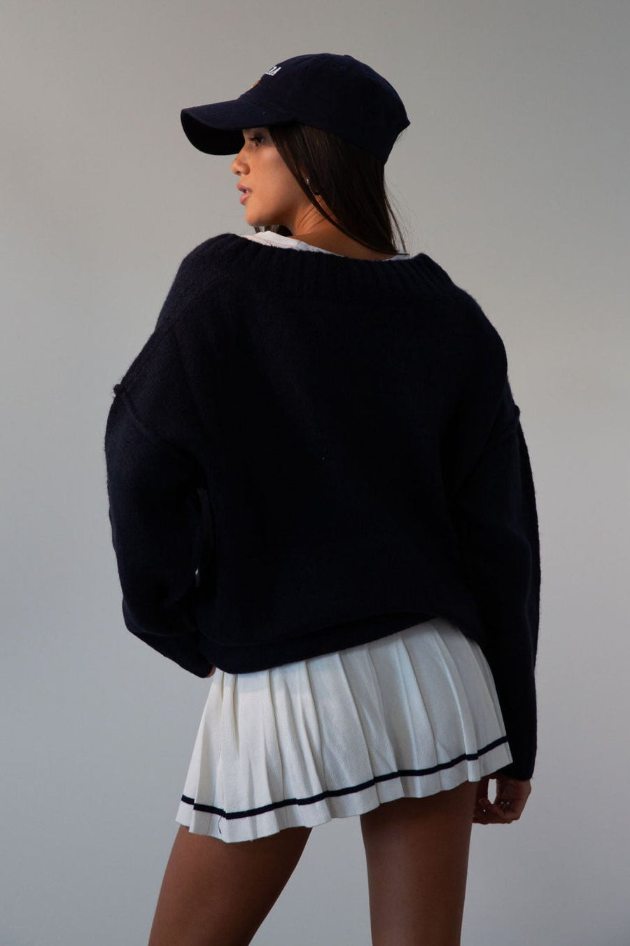 Pleated knit skirt. Elastic waistband. Shorts lining. white skirt. tennis skirt. fashion tennis skirt. preppy skirt. preppy outfit. fall outfit